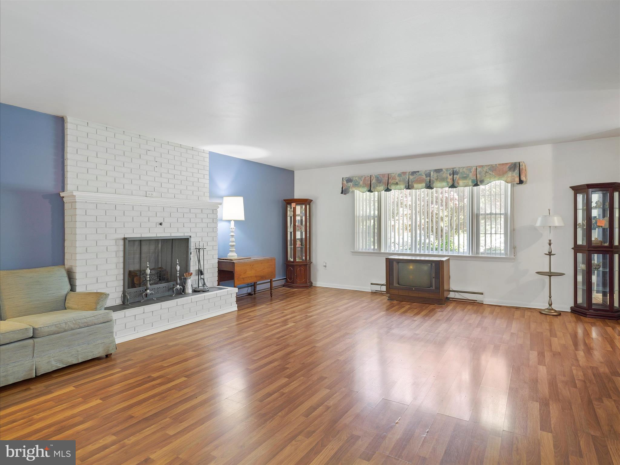 This home is much larger than it appears from the outside. It offers over 3200 finished square feet. The main floor living room is very large and incudes a wood burning fireplace. The main floor includes a kitchen, separate dining area, laundry room, 3 bedrooms (all with new carpet), and a full bath.
The lower level also includes a 2nd kitchen, full bath, a large living room with a fireplace and two rooms with built in shelves / closet space. A walk-out door provides direct access to the backyard, making the lower level ideal for entertaining or multigenerational living.
The backyard is mostly fenced for privacy and includes a large detached garage with a brand-new roof. Additional updates include a new water heater installed in June 2025.
This solidly built home is ready for its next chapter—don’t miss your chance to make it yours!