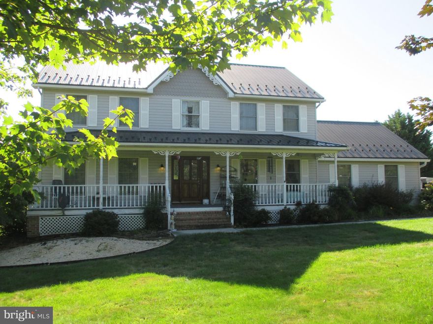 PRICE ADJUSTMENT RECENTLY MADE!!  Seller offering carpet allowance at settlement with acceptable offer.  Welcome to your new home in the heart of Smithsburg, Maryland! Tucked away on a quiet cul-de-sac, this spacious 5-bedroom, 3-bath colonial sits on over 3 acres, offering a rare blend of privacy and convenience. With 2,352 square feet of finished living space and an additional 1,176-square-foot unfinished basement, there's plenty of room for your family to grow.
Interior Features:
Step inside to find easy-to-maintain hardwood and luxury plank flooring throughout the main level. A grand wood staircase leads to the second floor, where you'll discover five spacious bedrooms and two full baths. The primary suite is a true retreat, featuring a large walk-in closet and an en-suite bath with double sinks. The primary bedroom also includes an adjoining room—perfect for a nursery, home office or quiet sitting area. A full bathroom on the main level adds convenience for guests.
Exterior & Location:
Enjoy the peaceful outdoors on your private front porch, complete with a porch swing, or entertain on the large rear deck under the remote-controlled patio cover. The low-maintenance metal roof provides peace of mind, and the two-car garage, storage shed, and ample parking offer plenty of space for vehicles and belongings. The partially fenced yard is ready for you to enjoy.
Located within walking distance of downtown Smithsburg and the highly sought-after Smithsburg schools, this home offers an easy commute with Routes 70 and 81 just minutes away. This home is an "as-is" sale with no HOA.
