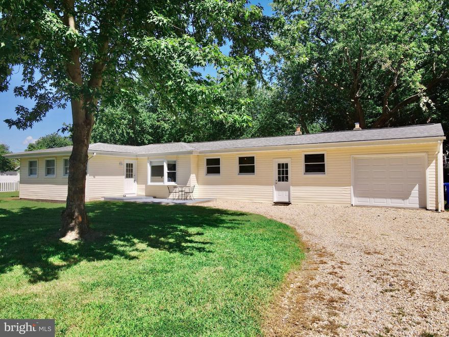 Just steps from the scenic Crab Alley Creek and a short drive to Crab Alley Marina. This charming four-bedroom, one-bath rancher offers both comfort and convenience in a prime location on a peaceful dead-end street just minutes away from shopping, restaurants and the Bay Bridge. Perfectly situated on a premium, level .44-acre lot, the home provides 1,492 square feet of living space all on one level—no stairs to contend with.

The open floor plan and hardwood flooring throughout create a warm and inviting atmosphere, while the attached oversized garage, with a large workbench, adds practicality for storage, hobbies, or projects.

Thoughtful updates in recent years bring peace of mind and efficiency, including:

UV filter on air handler, Newer Heat Pump, Newer roof & gutters, Encapsulated Crawl Space with sump pump and dehumidifier, Renovated kitchen & bathroom, Washer/Dryer & garage door, Reverse Osmosis water filtration system and whole house water softener, Fresh paint throughout, 

This home blends modern upgrades with single-level living in a sought-after waterside community. Whether you’re looking for a year-round residence or a weekend retreat, it’s a property that truly has it all.