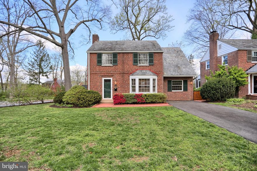**OPEN HOUSE***Sun, May 3rd,   2:00 PM - 4:00 PM***Classic all-brick colonial with slate roof and original hardwood flooring throughout in the Sudbrook Park historic neighborhood! If you seek the warmth and charm of an older home, you'll love this one! This quaint neighborhood designed by the Father of American Landscape Architecture, Frederick Law Olmsted, features winding roads, village greens, picturesque landscapes, and beautiful turn-of-the-century homes nestled into a canopy of majestic trees. This tight-knit community hosts family-friendly (and pet-friendly) parades and events year-round where neighbors can come together to celebrate cherished holidays. Park in your own driveway, sit on your own rear patio, and just soak in the beautiful mature trees, shrubs, and flowers that make Sudbrook Park so unique and appealing. It's a wonderful place to call home! This house offers a spacious expanded floorplan with updated kitchen, plus a first-floor family room. A traditional layout with formal living room, featuring built-in bookcases, a bonus bedroom/library warmed by a gas-burning free-standing stove, a dining room, and kitchen complete the main level. The second floor has 3 spacious bedrooms, all with original hardwood flooring and ample closet space, and a full bath. Original hardware and woodwork add charm and character, showing this home has been meticulously maintained. There's also a finished lower-level full bath, expanding the usable living space to 1500+ square feet! Updated mechanicals include furnace and hot water heater. Floored attic and shed offer ample bonus storage space!! Don't miss your chance to purchase a great house in a great location, convenient for commuting to Baltimore or the D.C. corridor, and close to shopping and all other amenities.