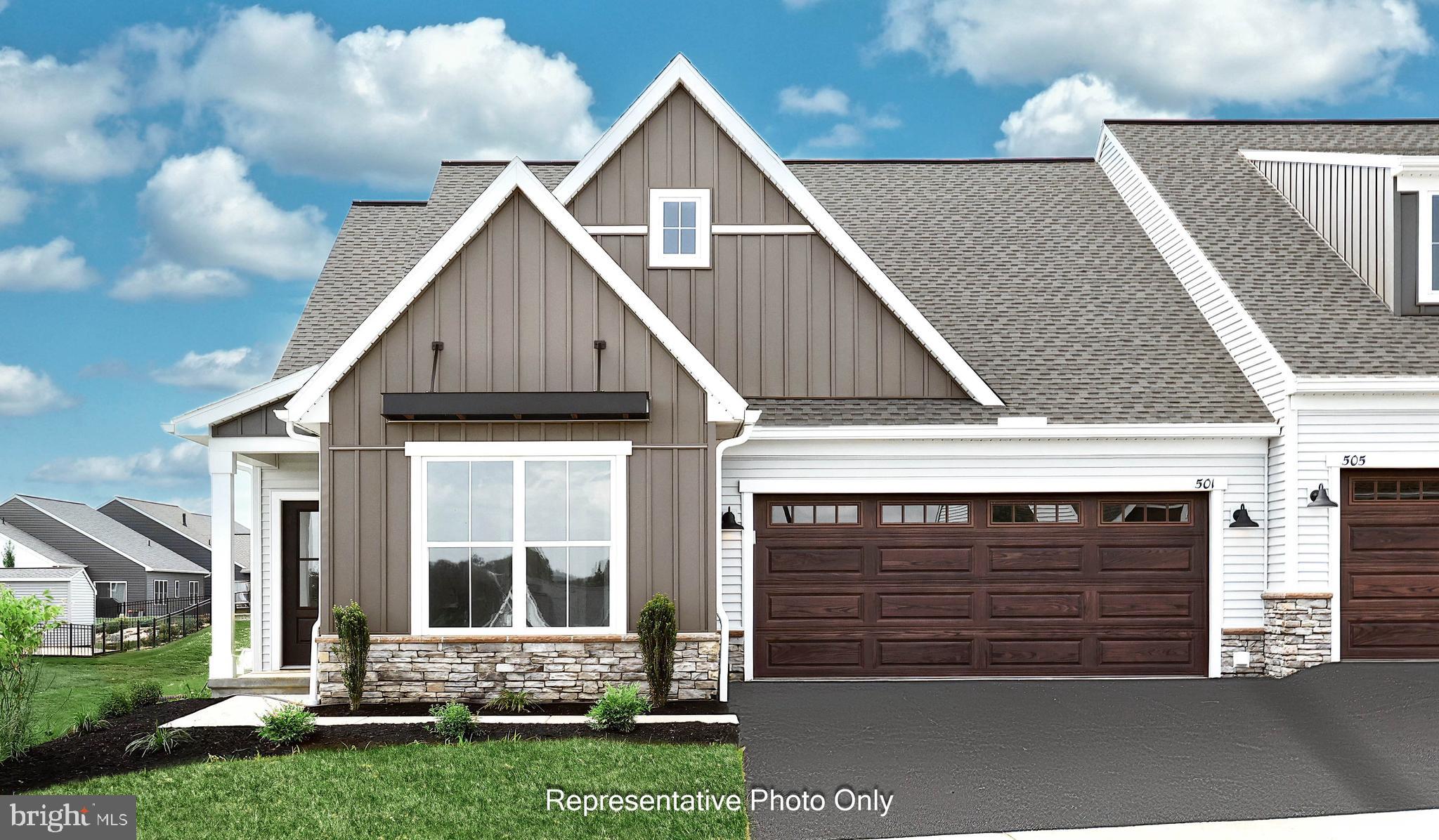 UNDER CONSTRUCTION – AVAILABLE THIS WINTER: This charming new duplex at Winding Creek 55+ is a thoughtfully designed 2-story home with 3 bedrooms, 3 full baths, and a 2-car garage with mudroom entry. The front entry opens to the foyer, secondary bedroom and bathroom, perfect for guests. Stylish vinyl plank flooring flows throughout the main living areas. The kitchen, well-appointed with quartz countertops, a tile backsplash, stainless steel appliances and a large pantry, is adjacent to the dining area and great room to create an open plan. The great room makes a grand impression with its cathedral ceiling and beautiful fireplace with floor-to-ceiling stone. Sliding glass door access in the great room leads to a composite deck, perfect for outdoor relaxation. Tucked quietly to the back of the home, the owner’s suite features an oversized closet and a private bathroom with a tile shower and double bowl vanity. A third bedroom, full bathroom, loft, and finished storage area are located on the second floor.