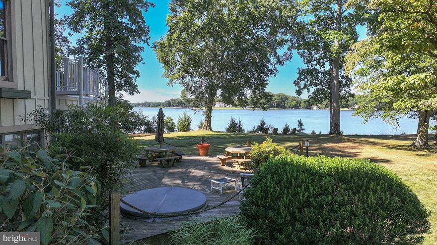 This amazing property is like no other.  Private w/ deep water.  The winding driveway leads to tennis court & 2-story tennis house w/ it's own driveway or stay on the main driveway to the main house.  The main part of the main house was built w/ materials from a 1730 barn.  Incredible beams, floor, doorways & more!  3 story great room w/ full stone  chimney w/ gas fireplace.  This dwelling provides 4 bedrooms & 2.5 baths spanning 3 stories, plus a lookout tower.  There is also an efficiency apt. over the garage w/ its own water views.  Roof &  HardiPlank siding are reasonably new.  There is an accessible crawl space & house generator.  Interior is very unique & special, still ready for your upgrades.  The tennis house has 4 rooms, reception area, a kitchenette, full bath & sauna.  It is far enough away from the main house to provide its own sandy beach front, great views & privacy.  DO NOT ENTER PROPERTY W/O APPOINTMENT!