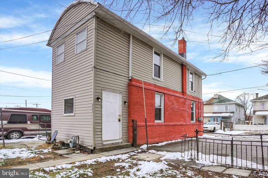 Single family, detached house freshly renovated with all new flooring, paint and bathroom updates.  This is a 2 bedroom home with 2 walk-in closets.  The yard is mostly fenced in and there is a 2 car parking pad accessed via Booth Ave.