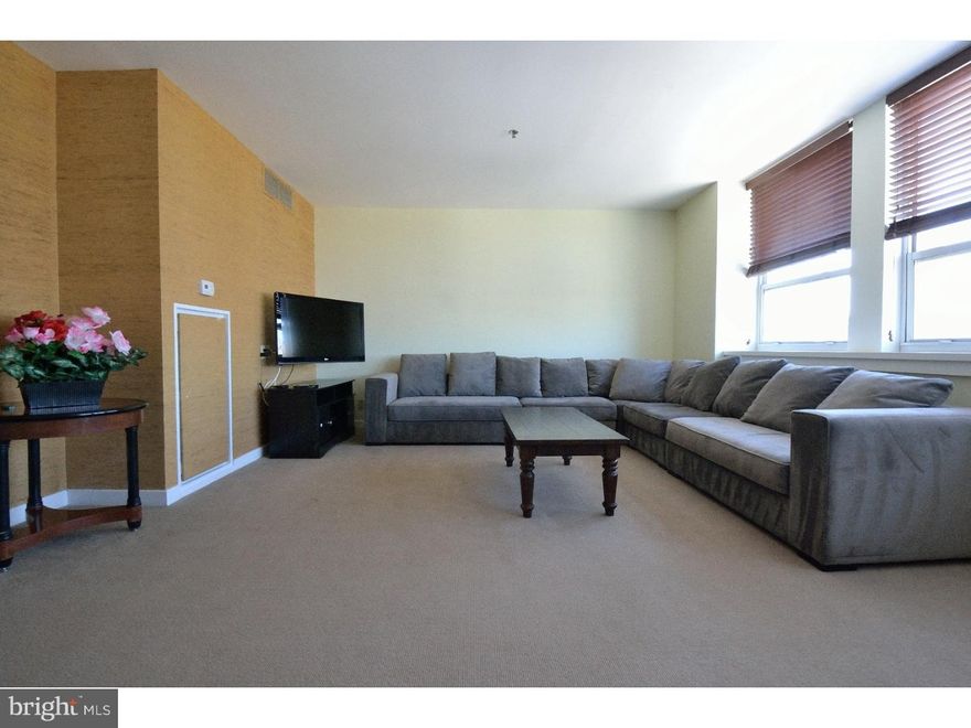 STUNNING CITY VIEWS. This is a spacious 1,100+ sq ft two bedroom condominium that was converted to be a deluxe, oversized one bedroom, one and a half bath unit, to feature extra living space from which to enjoy the expansive Center City skyline views. The living areas are graciously proportioned and feature custom built-in shelving and a wall of oversized windows that fill the home with natural light. Located at the Grandview Condominium, condo fees include ALL UTILITIES (gas, electric, water), basic cable, internet, a STORAGE unit in the basement, 24 hour concierge + live streaming security video access, a newly renovated state-of the-art fitness center, bicycle storage, expansive resident's lounge + catering kitchen, and GUEST PARKING. Perfectly situated in Chinatown, this pet-friendly home is steps away from fine dining, one-of-a kind shopping, and exciting nightlife. Reading Terminal Market, the Philadelphia Convention Center, Washington Square West, and interstate + public transportation access are just around the corner.