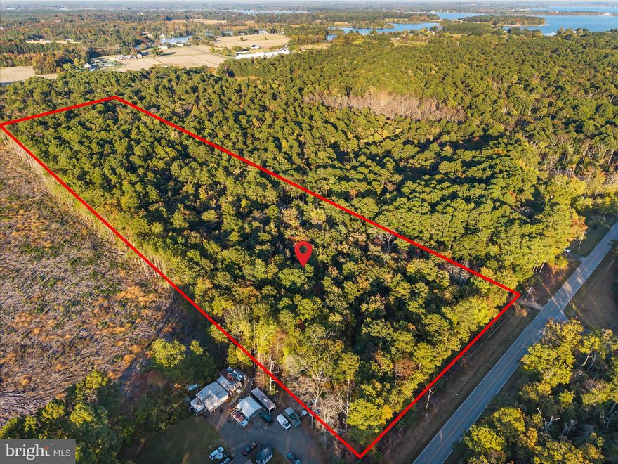 Discover the beauty and tranquility of country living on this large 4.02-acre parcel located across from the intersection of Hatchet Thicket Road and Olen Mattingly Road in charming Avenue, Maryland. This mostly level and wooded property offers a peaceful natural setting surrounded by the beauty of Southern Maryland’s countryside.

With an existing entrance, established trails, and a cleared area ideal for camping, this land is ready for your outdoor adventures. Whether you love hunting, camping, fishing, hiking, or simply escaping into nature, this property provides the perfect retreat. The location is just minutes from local waterways, making it easy to enjoy boating, fishing, and crabbing on the scenic Potomac River and nearby creeks.  Utilities are nearby for connection.

This versatile property also offers a variety of future possibilities—build your dream cabin or weekend getaway, create a private recreational retreat, or hold as an investment. If you’ve been looking for a quiet escape surrounded by nature—this is it!

Buyers interested in potential building, site development, or utilities should contact the St. Mary’s County Land Use and Growth Management Department to conduct their own feasibility study and confirm allowable uses, permitting requirements, perc information and available services.  Call listing agent for more information.

If you’ve been looking for a quiet escape surrounded by nature—this is it!

The trailers on the right side of the clearing off of the driveway are part of neighboring property.

Address: Across from Hatchet Thicket Rd & Olen Mattingly Rd, Avenue, MD
Acreage: 4.02 acres
Access: Existing driveway entrance & interior trails
Nearby Activities: Hunting, camping, fishing, crabbing, boating, hiking
Don’t miss this opportunity to own a piece of Southern Maryland’s great outdoors!