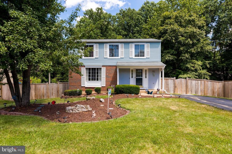 You'll fall in love with this charming SF! Enjoy coffee on your screened in porch & Barbecue on your spacious deck or patio overlooking a fenced yard backing to lush trees.  The kitchen is appointed with SS appliances, granite counters, backsplash & new cabinetry. Pergo flooring in FR & entryway. /4 spacious bedrooms upstairs.. New Roof was installed in 2015. Close to shopping, commuting and I95.