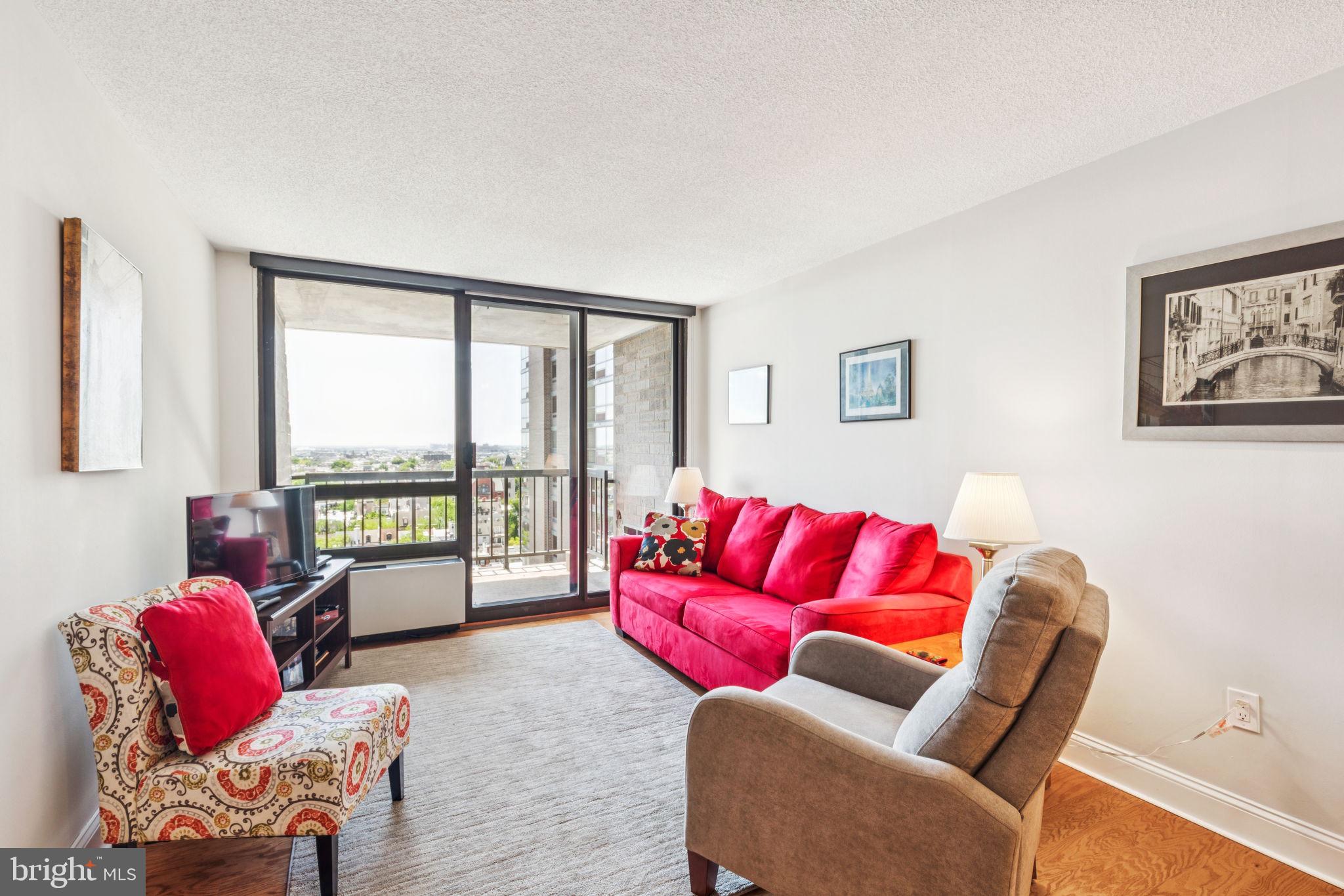Bright and spacious one bedroom with a private balcony boasting southern views at Independence Place, Tower II. This beautifully-appointed home features an open layout, beautiful natural light from floor-to-ceiling windows, see-forever views of southern Philadelphia and the Delaware River, and hardwood floors throughout. Enter through a foyer with large coat closet into the open great room with ample room for living and dining and access to the private balcony, perfect for enjoying a morning cup of coffee. Adjacent is the updated kitchen with ample wood cabinetry, granite countertops, custom stone tile backsplash, stainless steel sink with garbage disposal, stainless steel appliances, and a large passthrough overlooking the great room. The generously sized bedroom enjoys more natural light from floor-to-ceiling windows and excellent closet space, including two large walk-in closets and a wall closet. Across from the bedroom is the fully updated bathroom with large white vanity with marble top, tub shower with stylish tilework, and a stone tile floor. There is also a laundry closet with combo LG washer/dryer. Residents of Independence Place enjoy a twenty-four-hour doorman and concierge, brand new lobby and state-of-the-art fitness center, on-site management, individual heat & air conditioning controls, and on-site parking with direct access to the building, subject to availability and a monthly fee. Location is everything...Independence Place is located in the historic Society Hill neighborhood of Philadelphia facing Washington Square. Many of the city's finest museums, cultural institutions, theaters and restaurants are only a short walk away. 30th Street Station and Philadelphia International Airport are only minutes away