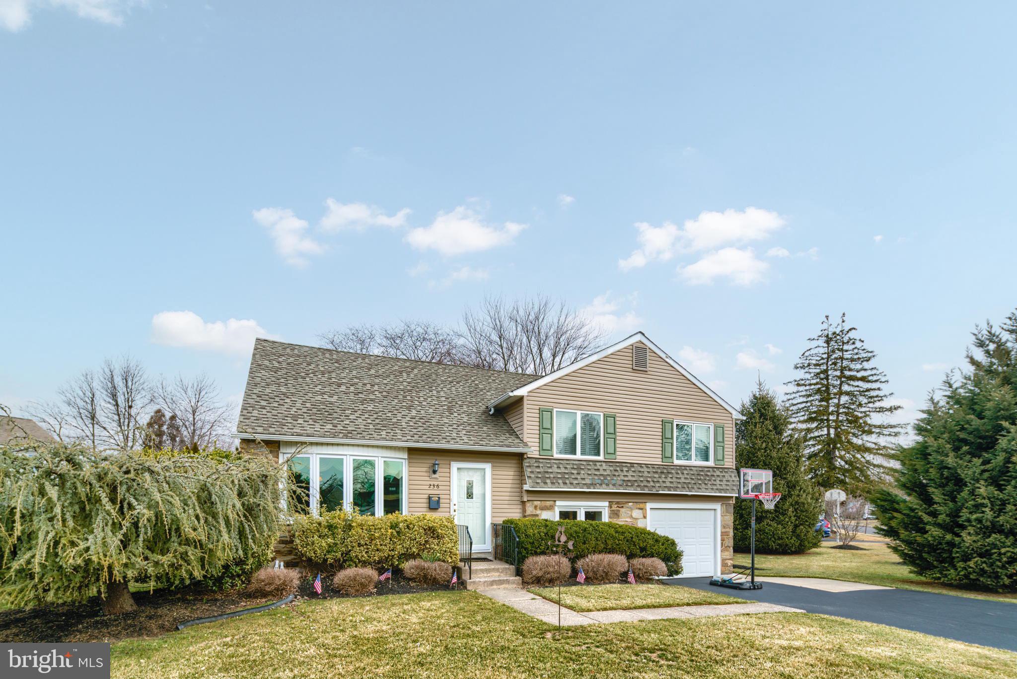 Welcome to 236 Hickory Road, a 4 bedroom 2 and a half bath split level located in the Rosewood Park section of Warminster Township.  Enter this lovingly maintained home through an inviting living room that was previously used as a formal dining room.  Oversized eat in kitchen has cherry cabinetry, granite counter tops, bamboo flooring, and lots of pantry space.  Kitchen is open to a spacious great room addition in the rear of the house.  Here you'll find a beautiful stone fireplace, lots of windows and double doors leading out to a private covered cement patio. Lower level of the home has a family room, powder room, and a large laundry room / mud room with an exterior door to the driveway side of the house.  First upper level features 3 bedrooms and an updated hall bathroom.  Second upper level is where you’ll find the primary bedroom with en suite bathroom, ceiling fan, large closet, and door to attic storage.  Plantation shutters have been installed on the upper level windows. There is an attached 1 car garage, a large driveway, and fenced rear yard with a storage shed. Lots of space for the whole family, call today for your appointment.
