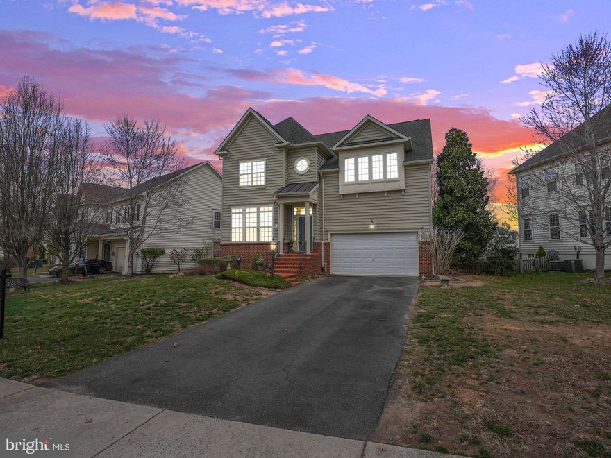 **Stunning Luxury Home with Three Fully Finished Levels – A True Gem!**

 Welcome to your dream home! This exquisite high-end residence offers an abundance of space, elegance, and modern amenities, making it the perfect sanctuary for discerning buyers. Nestled in a serene neighborhood, this magnificent property boasts generous-sized bedrooms, including an oversized primary suite that features a cozy sitting room – perfect for relaxation. 

**Key Features:** 

**Expansive Primary Suite**: Experience luxury in the oversized primary suite with a 10 foot tray ceiling, and plenty of windows creating a light and airy aesthetic. The primary suite is complete with a sitting area, elevated lighting, two large walk in closets, and a large bathroom. Indulge in the extra-large shower with dual showerheads or unwind in the soaking tub, all adorned with beautiful tile flooring, and a convenient makeup area. 

**Spacious Secondary Bedrooms**: Two of the secondary bedrooms are equipped with walk-in closets, while the third features a closet that spans the length of the room, providing ample storage for all your needs. 

**Convenient Upstairs Laundry**: Say goodbye to lugging laundry up and down stairs! The large upstairs laundry room with built in shelving, adds convenience to your daily routine. 

**Chef’s Kitchen**: The heart of the home is the chef's kitchen, showcasing beautiful maple cabinets, custom granite countertops, a double sink, two pantries, and a spacious island bar with a cooktop. Perfect for culinary enthusiasts!

**Finished Basement**: The fully finished basement is a true entertainer’s dream, featuring a family room and a bar area, a full bathroom, and bedroom (NTC). There is also an unfinished bedroom that could be finished to be a 6th bedroom, or an office. The Vegas-themed game room is a delightful surprise, complete with slot machines and pinball games that can convey with the home if desired! 

 **Elegant Living Spaces**: The first floor boasts elevated lighting throughout, gleaming hardwood floors in the living room, dining room, and kitchen, while the family room features plush carpeting with an upgraded rug and pad. Cozy up by the stunning gas fireplace on chilly evenings. 

**Outdoor Oasis**: Step outside to the brand-new composite deck that offers breathtaking views of the treetops in the backyard, ensuring complete privacy for your outdoor gatherings. 

**Two-Car Garage**: The attached two-car garage is equipped with shelving and 2 electric vehicle chargers, providing convenience and functionality.

 **Beautifully Landscaped**: The fenced backyard is adorned with mature trees and easy-care shrubs in the front, creating a picturesque setting that enhances the curb appeal. 

**Amenity Rich Community** This home is located in the highly coveted Stafford Lakes Village with fantastic amenities including a club house, large outdoor pool, walking & bike paths, multiple tot lots, basketball courts, tennis courts, and more!

**Great Location** The location couldn't be better. You are minutes from I95 & commuter lots, you are also about 15 minutes away from 2 different VRE stations, and 15 minutes from historic downtown Fredericksburg with countless options for shopping, dining, and entertainment. You also right around the corner from Lake Mooney Park, which features a 520 acre lake with a boat ramp, fishing opportunities, and hiking trails. 

This home is truly a must-see! Experience the perfect blend of luxury, comfort, and entertainment in this stunning residence. Schedule your private tour today and make this dream home your reality!

** The HVAC was replaced in 2020, and the water heater in 2015, a brand new composite deck was added in 2025**