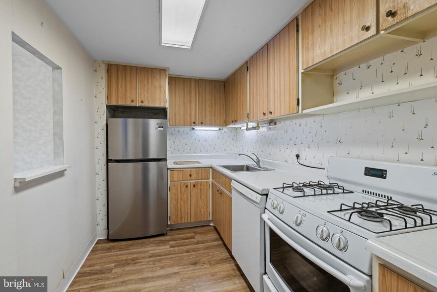 Gracious living in the most prestigious Beaver Hill Condominium. You can easily make this your own with the brand new wood flooring just waiting for your personal touches. Spacious one bedroom with 16 foot balcony having spectacular  panoramic views. Versatile floor plan for easy furniture placement.  An abundance of closet and storage space.  This unit maximizes the natural light---feels like a real home with lots of windows. King size bedroom with walk in closet, full ceramic tile bath, with separate vanity area for added convenience.  An abuncance of closets for linens, coates, and misc. The entry foyer is spacious with 2 generous closets. The kitchen is gas cooking, dishwasher, garbage disposal and SS refrigerator and has ample cabinet and counter space..  The building is well maintained with all utilities included except cable. Central heating and AC is maintained  and annually serviced by the condo association . A  gym, and outside pool (for a small  fee) are added amenities.  An abybdabce of parking around each building for you and guests.. Garage space when availalbe for  a monthly fee. Walk into jenkentown for all the little shops, cafes, boutiques etc. Walk  to train, bus, shopping and recreational and cultural events. Jenkintown is like small town living with music and art festivals etc. with the convenience to city life.  Experience a lifestyle of easy day to day living as casual or as formal as you like.