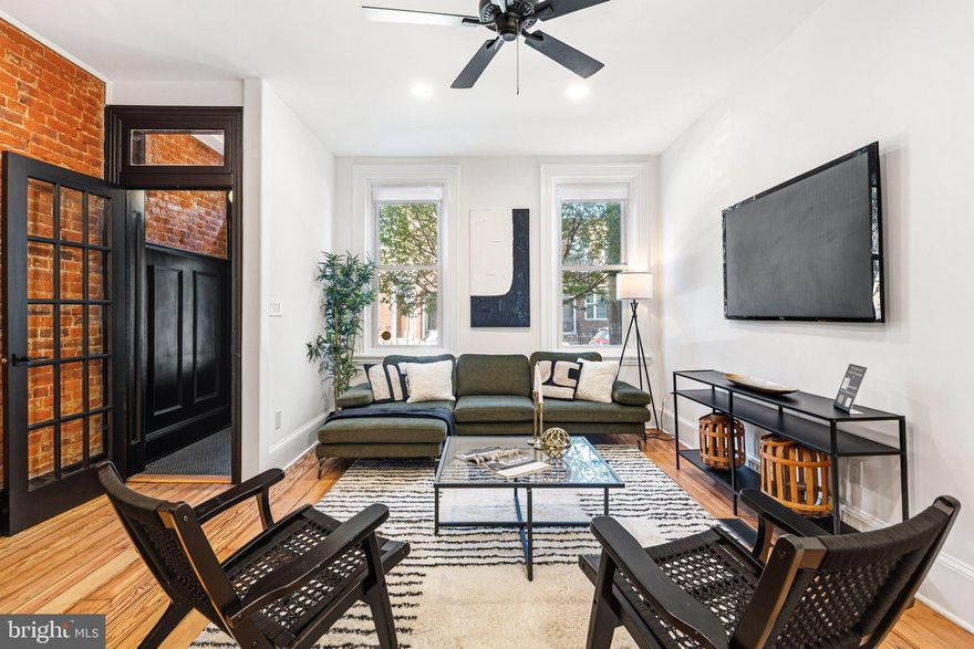 Welcome to 1626 E Eyre Street — Newly renovated with a 10‑year Tax Abatement, this luxury 3‑bedroom, 4‑bathroom (2‑full & 2‑half) home is perfectly positioned in the heart of Fishtown, one of Philadelphia's most coveted and culturally vibrant neighborhoods. There is NO better location to live in Fishtown! Thoughtfully redesigned with premium finishes, expansive ceiling heights, exposed brick accents, and a spacious, intuitive layout, this residence blends modern luxury with classic Philadelphia charm — including original pumpkin pine hardwood flooring and much of the original moulding, both meticulously restored to preserve the home's authentic character.
The main level welcomes you with a bright and inviting living room, filled with natural light and restored character. From there, the home flows into an expansive kitchen and dining area where sleek cabinetry, high‑end appliances, and generous counter space create a chef‑ready environment ideal for both entertaining and everyday living. A dedicated laundry and mudroom at the rear adds convenience and functionality, opening directly to an oversized, south‑facing private backyard — a rare luxury in Fishtown. Bathed in fantastic sunlight throughout the day, this outdoor oasis is perfect for hosting gatherings, relaxing, gardening, or creating your own serene urban retreat — and for watching your favorite team make a playoff run! Best of all, the property directly behind is a dedicated HOA parking lot (protected open space), meaning your light, sightlines, and privacy will never be compromised by future development.
The second floor offers two generously sized bedrooms — both with custom built‑in closets — and a beautifully updated full bathroom featuring a walk‑in steam shower and deep soaking tub, providing a spa‑like escape for guests or family members. Ascend to the top level to discover a private primary suite that spans the entire floor. This sanctuary includes a large, sun‑filled bedroom, a spa‑inspired bathroom with elevated finishes — including a Toto Washlet heated bidet for an extra touch of everyday luxury — and a custom built‑out walk‑in closet designed for exceptional storage and comfort. The perfect end (or beginning)‑of‑day retreat. From the third floor, a roof hatch provides direct roof access, and the roof structure has already been prepped for a future roof deck — a turn‑key opportunity for a new owner to add skyline views and additional outdoor living space.
Additional highlights include a full‑length basement offering abundant storage or rec space, a whole‑home water filtration system, and a multi‑zone HVAC system combining a forced‑air furnace with multi‑zone mini‑splits for precise, efficient climate control on every floor. Every detail has been curated to deliver a refined, move‑in‑ready experience.
Live just steps from everything that makes Fishtown one of the most desirable neighborhoods in the country. The home sits in a sweet spot bordered by Frankford Avenue, Palmer Park, Palmer Doggie Depot, and historic Palmer Cemetery, and is an easy walk to the best restaurants and happy hours in the city — including Michelin‑recognized and James Beard–honored dining, boutique shops, craft breweries, cafés, and vibrant nightlife. The Market‑Frankford Line is only a few blocks away, offering effortless access to Center City and beyond. As an added bonus for the next owner, the street is currently undergoing a water main replacement and is slated to receive brand‑new paving, curbs, and sidewalks — a fresh, upgraded streetscape to match the home itself.
This is more than a home — it's a lifestyle. A rare opportunity to own a spacious, fully renovated property with exceptional outdoor space in one of Philadelphia's most sought‑after neighborhoods.
