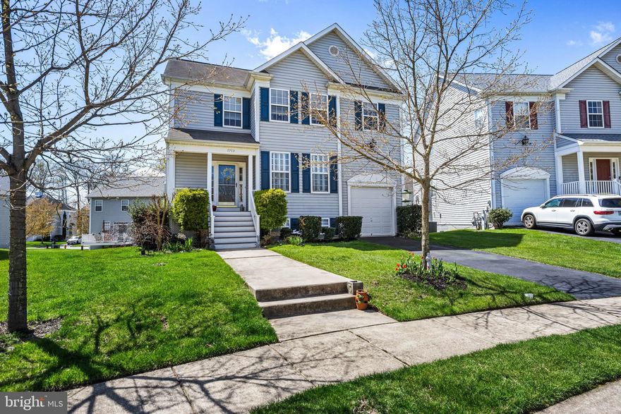Hopewell Pointe a water oriented community in Essex - Colonial with 3/4  bedrooms, 3/1 baths and a deeded boat slip... Open floor plan with a foyer, powder room, coat closet, traditional living and dining room, eat-in kitchen with ss appliances, pantry and family room with gas fireplace plus access out to the deck - Upstairs has 3 spacious bedrooms all with vaulted ceilings, 2 baths, laundry and a cozy reading nook - Primary bedroom has two closets, attached bath with soaking tub, double vanity and shower - Lower level has another family area, office/bedroom, full bath, plenty storage and walk out to the back yard - Hardwood floors on main level, plantation shutters, ceiling fans and tons of natural light - Attached 1 car garage with loft for extra storage - Deeded Boat Slip on Pier B #38 with ladder for easier access to your boat - This Wonderful Community offers a walking path, pool & spa and  plenty of wildlife -