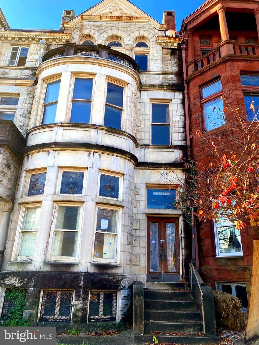 This historic Baltimore rowhome nestled in the Reservoir Hill neighborhood is a perfect renovation opportunity for a motivated buyer!  The property features original molding throughout, original stained glass, hardwood floors, ornate, inlays, and other gorgeous historic finishes.   Just steps from Druid Lake Park and Madison North/Reservoir Square.  All buyers must present proof of financing and a scope of work and timeline for completion from a licensed MHIC contractor for approval of the City of Baltimore.

According to publicly available information, the Reservoir Hill neighborhood will benefit from two ongoing development projects in its immediate vicinity:

The Madison Park North project will feature a $150MM multi-block redevelopment of North Avenue, extending over 8.1 acres.  The project will include a park, increase green space, new roads intended to improve access, mobility, and walkability, 120 new townhomes, a grocery store, street level-retail and office spaces.

The Druid Hill Park Reservoir project will feature a $145MM reconstruction of the reservoir with an additional 14 acres of park space, new paths for pedestrians and cyclists, widening of existing promenades, new outdoor lighting and an amphitheater.