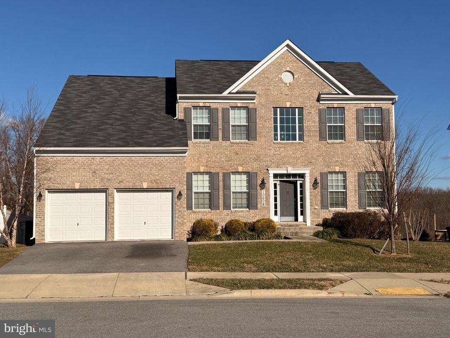 Nestled in the prestigious Woodburn Estates, this exquisite Colonial-style residence, built in 2019, offers a harmonious blend of modern luxury and timeless elegance. Spanning an impressive 3,820 square feet, this detached home invites you to experience a lifestyle of comfort and sophistication. Step inside to discover a thoughtfully designed layout that seamlessly integrates spacious living areas with refined finishes. The partially finished basement provides endless possibilities for customization, whether you envision a cozy entertainment space or a private retreat. The heart of the home features an inviting atmosphere, perfect for both intimate gatherings and grand celebrations. The attached garage, accommodating two vehicles, ensures convenience while maintaining the home's aesthetic appeal. Surrounded by the serene beauty of Woodburn Estates, this property offers a tranquil escape from the hustle and bustle of everyday life. Enjoy leisurely strolls through the neighborhood or unwind in your private sanctuary, where every detail has been meticulously crafted to enhance your living experience. With no pool to maintain, you can focus on what truly matters-creating cherished memories in a space that feels like home. This residence is not just a house; it's a lifestyle, waiting for you to make it your own. Embrace the opportunity to elevate your living experience in this remarkable property.