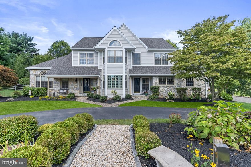 SELLER COMPLETED A TOTAL HOME STUCCO REMEDIATION & a NEW 50 YEAR ARCHITECTUAL SHINGLE ROOF in JULY 2022!   New James Hardie siding to all front aspects of the home with the remaining walls in matching vinyl siding. Added AZEK picture framing to wall surfaces, windows, doors, along roof lines and at ground level. Installed all new white aluminum capping, facia, soffits, gutters and downspouts throughout the home. This EXCEPTIONAL one-of-a-kind property with no HOA includes the main house with attached carriage house is sitting on 1.3 acres PLUS an adjoining 1 acre approved building lot is included in the price a ($175,000 Value) for a TOTAL of 2.3 acres. This house was meticulously built…by the builder…. for the builder and his family! The house is sited on a gorgeous professionally landscaped, flat lot with a private back yard, an inviting swimming pool and borders conserved open space and a farm. The BONUS is that the property includes a fully subdivided improved building lot! Additionally, this is a TWO-FOR-ONE property! The MAIN house includes 4 bedrooms, 2 full and 2 half baths, a three-car garage and a finely finished lower level. It has a large open floor plan, large Pella windows allowing for enormous amount of natural light throughout. The gourmet kitchen includes a Butler’s Pantry, quartz countertops, stainless appliances, 42” cabinetry and is adjoining the breakfast room with sliders to flagstone patio. There is a large family room with fireplace & hardwood flooring, a wonderful screened in porch and a working office with private entrance. The CARRIAGE House is attached through a common first floor laundry room & has 1,700 s/f of living space. The Carriage House features a private entrance, its own separate utilities and internet and contains the 5th bedroom. The 1st floor includes an open DR and LR with 9’ ceilings, dedicated front entry, Eat-In kitchen, laundry closet, full bath, main BR with walk-in closet and a quaint bonus room. The 2nd floor loft with cathedral ceiling has its own powder room. There is a covered maintenance free deck and steps to a flagstone gathering area and access to the pool. Come and see for yourself this rare opportunity to live in East Bradford Township near the Borough of West Chester, in a bucolic setting with the flexibility that meets the needs of today’s families. The property is perfect for a multi-generational family or a family needing private living space for a nanny, caregiver or grandparents!