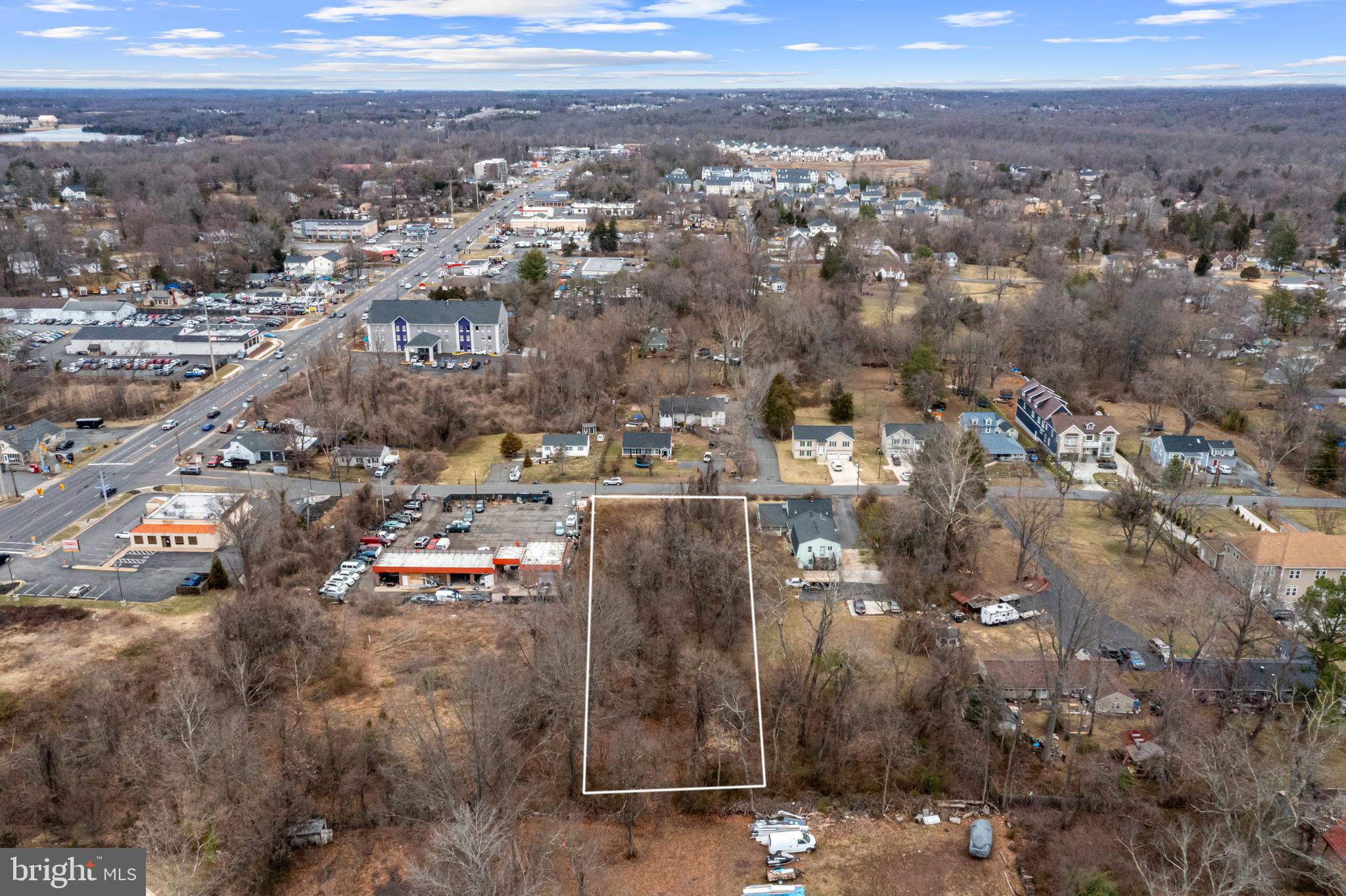 Prime Development Opportunity – Unlock the potential of this 0.92-acre raw land site, ideally situated just off Rt 28 in a rapidly growing area. While currently zoned for residential use, the property is adjacent to B1-zoned land, presenting a compelling opportunity for potential rezoning (buyer to conduct due diligence). This level, rectangular lot offers public water and sewer access at the street and is partially cleared, providing a strong foundation for future development. No soil study or on-site utilities are currently in place, and the buyer will be responsible for any necessary studies or rezoning investigations. Verified seller.