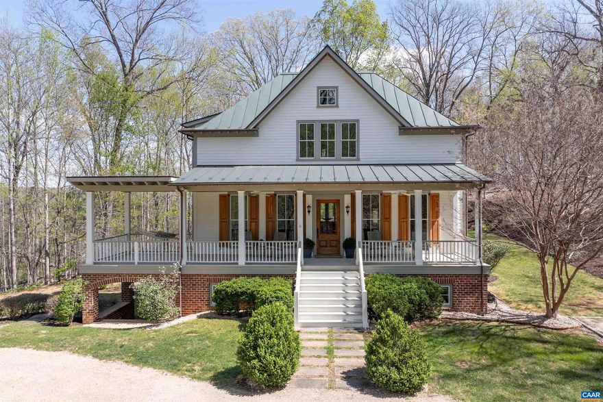 Sited on over 23 exceptionally private acres with mountain views, this Peter Johnson built, quintessential Virginia farmhouse perfectly captures today's taste for bright, open living spaces warmed by striking accents that create a sophisticated, yet cozy feel. Step inside & prepare to be wowed by beautiful hardwood floors milled from trees from the property, stunning ceiling beams recovered from a Pennsylvania bank barn, and a handsome reclaimed wood and soapstone island that is the centerpiece of the kitchen.  Floor to ceiling windows flood the home with natural light, while a dramatic stone Rumford fireplace in the great room offers a focal point for family gatherings.  The idyllic setting is highlighted by brick and stone walls and patios, and multiple outdoor spaces for enjoying the solitude.  Though current owners have enjoyed this property as a relaxing getaway their intention had always been to add a primary suite for more permanent living.  All systems, including septic and geothermal HVAC, are sized to accommodate an addition.  Built to exacting standards & meticulously maintained, this stunning property is just 20 min. to C'ville airport, 15 min. to Downtown Cville, Martha Jefferson & UVA Hospitals, & UVA Grounds.,Marble Counter,Soapstone Counter,Wood Cabinets,Fireplace in Great Room