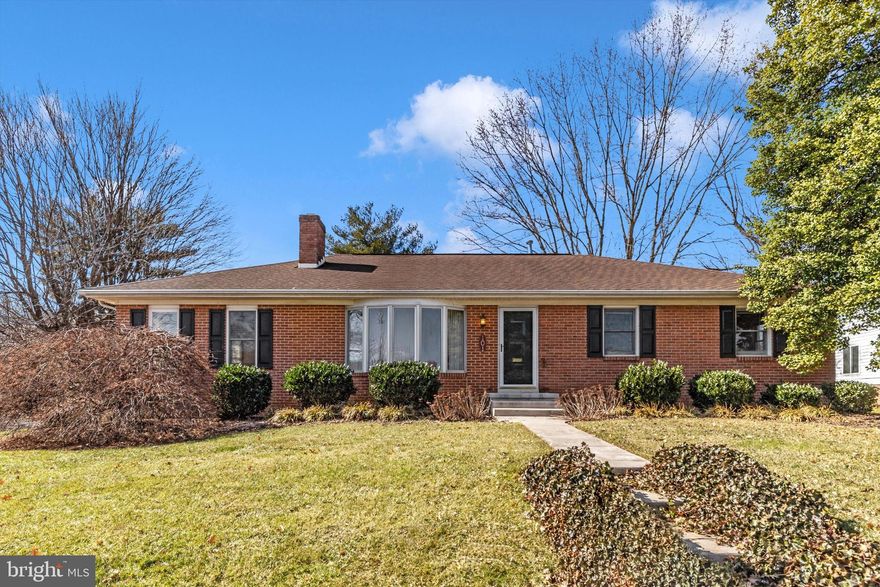 All offers due by 5:00, Sunday 2-23
Fall in love with this gorgeous rancher on sought after Fairview Avenue which sits on a .49 acre lot!   This 4 bedroom, 3 bathroom rancher is in an ideal location.  Wait until you see this rare feature for this area- the oversized 3 bay garage!  The living room and family room share a double-sided gas fireplace and both have hardwood floors. Enjoy cooking under a skylight with a double convection oven and a gas stovetop in the kitchen containing tile flooring.   You will love meals around the large island or in the adjoining dining room with hardwood floors. There are 3 nicely sized carpeted  bedrooms on the first level.  The primary bedroom has its own full bathroom along with another full bath in the hallway.  This level also contains a possible office area near the family room and a mudroom/laundry area.  The dining room has French doors which lead to an all season covered porch/sunroom!  This is a great place to relax with heating and air conditioning along with a view of the spacious backyard, mature trees and pergola.  
The lower level has a large recreation room with a gas fireplace, a possible 4th bedroom with an egress window and a large full bathroom!  There is plenty of storage space, a possible 2nd laundry area and a step up exit to the backyard.
All finished walls on both levels have had a fresh coat of paint, the HVAC was replaced in 2022 and it has a newer roof.  
The incredible detached garage measures approximately 30x40, has recessed lighting, built-in storage, 3 bays along with a side door entry.  This is a wonderful space for car enthusiasts and can be used for so many different purposes!
Located near all major Frederick area traffic routes, restaurants and shopping downtown and the Golden Mile and within walking distance of Baker Park, this gem will go quickly!!  It’s rare to find a home like this on Fairview so book your showing today!