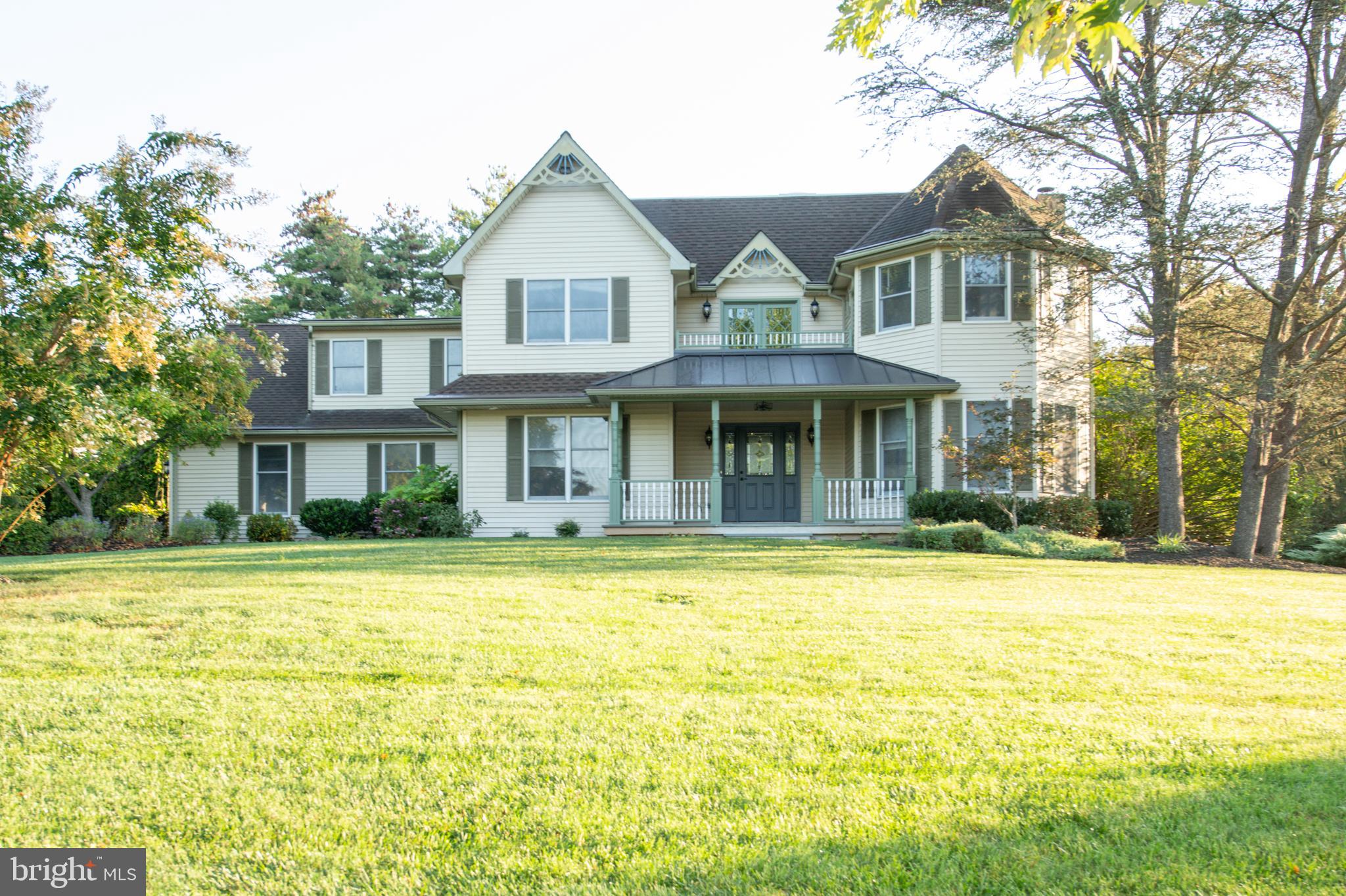Nestled at the end of a quiet cul-de-sac in the sought-after Devonshire community, this enchanting home sits adjacent to 70 acres of preserved open space and offers sweeping sunset views of 1,700-acre Tyler State Park from its majestic front porch and second-floor balcony. You’ll feel you're in the country--yet enjoy the convenience of major shopping and gourmet dining less than 2 miles away.
Just what you've been searching for, this neutral, freshly painted 4-bedroom, 2.5-bath home is filled with charm, from whimsical gingerbread trim to the romantic Romeo & Juliet balcony. Move - in ready with new first-floor carpeting, the classic yet elegant design will not disappoint. A handsome slate walkway leads to the inviting covered front porch with stately columns—the perfect spot to enjoy morning coffee or to unwind in the evening.
Step inside to a generous foyer flanked by a formal dining room with crown molding, wood floors, and a pass-through to the butler’s pantry, and a sun-filled living room with angled windows & crown molding which flows into a cozy step-down family room with a stone fireplace w/ mantle. A nearby sitting room opens to the bright and airy three-season room with walls of windows and a ceiling fan, ideal for relaxing or entertaining. With a finished basement complete with wet bar and multiple outdoor entertaining areas, this home offers plenty of flexible gathering spaces.
The gourmet kitchen boasts abundant cabinetry, granite counters, a large center island, pantry, garden window over sink and brand-new second oven. A breakfast room with a bow window overlooks the expansive backyard. The adjacent butler’s pantry offers wine storage, cabinetry, and a built-in desk—perfect as a prep or work space. A utility closet and powder room complete the main level.
Upstairs, double doors lead to the spacious main suite with a wood-burning fireplace, vaulted ceilings, three angled windows, walk-in closet, and spa-like bath featuring a walk-in shower, and linen closet. Three additional bedrooms offer ample space, each with closets and ceiling fans, and a hall bath with double sinks & laundry area is conveniently located on the second floor with newer washer and dryer.
A special highlight is the sitting area with sliders to the private Romeo & Juliet balcony, where spectacular mile-long sunset views await. Additional storage closets and spiral stairs lead to a widow’s watch
The finished basement provides versatile living with a serious wet bar, cedar closet, storage, two sump pumps, and French drain. A backup generator with manual transfer switch keeps essentials running smoothly. The two-car side-entry garage offers extra storage, laundry tub, windows, and fresh paint.
Outdoors, enjoy your private, fenced, tree-lined yard with oversized deck, perfect for hosting memorable parties. The spacious front yard and cul-de-sac location offer even more privacy, and a shed provides additional storage.
This home combines timeless charm and modern comfort, an idyllic setting in the award-winning Council Rock School District. Just minutes to shopping, restaurants, historic Newtown Borough, Tyler State Park, and commuter routes to Princeton, Philadelphia, and New York City—this one-of-a-kind Devonshire home is truly a slice of heaven.