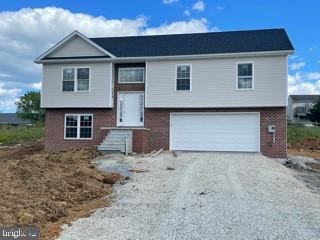 Brand new 4 bedroom 3 bath home in Waynesboro, PA! Main floor large living room with high ceilings. Kitchen all new stainless steel appliances & granite countertops with 3 bedrooms and 2 baths. Lower level has another bedroom, walk in closet, laundry room & another full bath with a 2 car garage. This beautiful home is ready for someone to make it theirs.