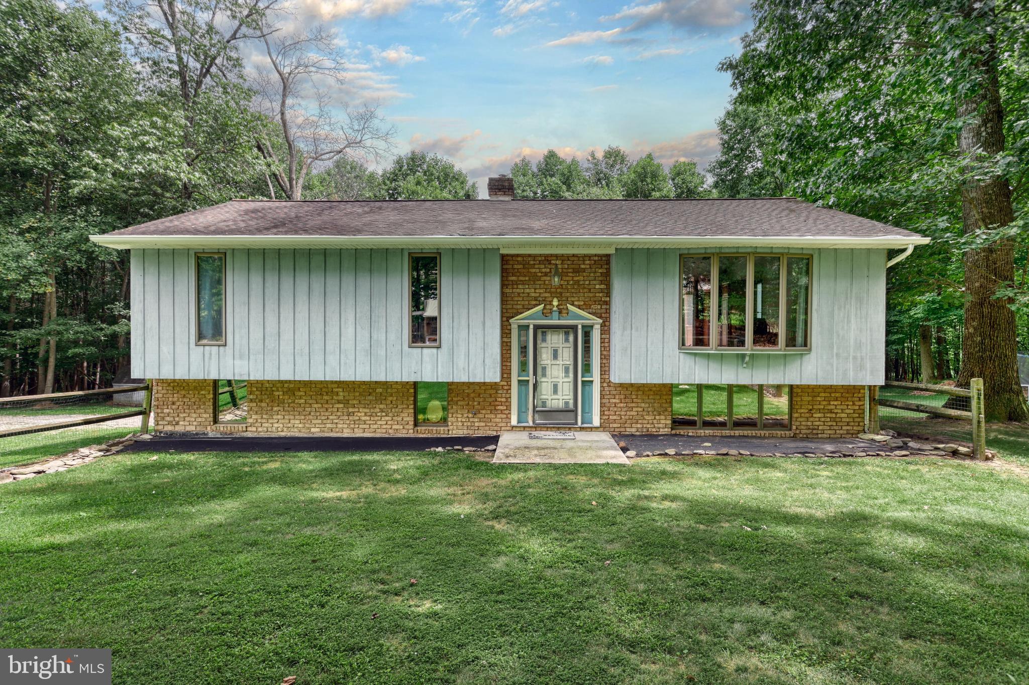 ULTRA RARE opportunity awaits in the Pigeon Hills!!! This Raised Ranch home that sits on almost 3 Acres will allow you to not only live in this PRIVATE Location but also Conduct Business as Well!!! If you are someone that works in a garage this is the GOLDEN opportunity you have been waiting for! Zoned for both Residential and Commercial this property will allow you everything you ever needed to do absolutely EVERYTHING on your property!!! Private drive will lead you back into your remote oasis surrounded by woods and allow you to have all the space you ever wanted for hunting, 4 wheeling, and other recreational adventures :) The House itself is move in ready and loaded with charm giving it an extremely COZY feel! 3 beds 1 and a half baths and equipped with cathedral ceilings and plenty of finished space to spend your days! Enjoy hanging out on the Large Deck on those Beautiful Days while your family and friends spend hours of FUN with all that this property boasts! ENORMOUS garage was once used as a licensed operation and can EASILY be set up to pick up where the last owner left off. Literally EVERYTHING you need is already there!!!
Take advantage of this Awesome Set Up, Schedule your private tour today and see this for yourself!!!