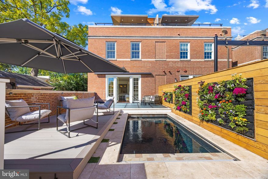 A One-of-a-Kind Old Town Retreat!
  
Welcome to one of Old Town’s most extraordinary residences — the only home in the city offering an elevator to all four levels, a private fenced yard with a jetted pool and separate apartment above a 2 car  detached garage. A total of over 5200 finished sq ft.

This semi-detached, sun-filled end home was the first to be purchased in its sought-after development, allowing the owners to collaborate with renowned architect Robert Adams to create a truly bespoke interior. Completed in 2019, every detail reflecting thoughtful design, modern luxury, and timeless craftsmanship.

The main residence features four bedrooms, 2 offices,  three full and two half baths.  The open-concept kitchen showcases Italian Snaidero cabinetry, quartz countertops, and Thermador appliances, blending sophistication and functionality. Waterworks fixtures and heated floors in all baths speak to the home’s commitment to comfort and quality.

Designed by McHale Landscape Design, the outdoor oasis is centered around a custom spa pool with jets, automatic cover, and an ingenious sliding deck that transforms the area into a spacious entertainment zone. The separate two-car garage with EV capability includes a private apartment complete with kitchenette and full bath, ideal for guests, au pair, or studio use.

Additional highlights include a versatile lower level wellness room, perfect as a greenhouse, sauna /cold plunge room, art studio, gym, or yoga retreat. The main level offers flexible living options.  The main level offers flexible living options, with a 2 private offices.

This exceptional home combines the charm of historic Old Town with the best of contemporary luxury living — an unmatched residence designed for elegance, comfort, and connection.