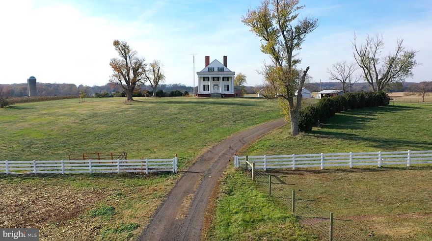 Auburn Farm – A Historic Greek Revival Estate on 422 Acres in Brandy Station, VA

Step into a living piece of American history with Auburn Farm, a distinguished Greek Revival home built in 1850 and proudly listed on the National Register of Historic Places. This five-bedroom, three-and-a-half-bath residence retains many original details, from its stately moldings to elegant period features, and awaits the next steward to restore it to its full glory.

Nestled on 422 sprawling acres, Auburn Farm offers historic outbuildings including a summer kitchen with upstairs sleeping chambers, a tenant home, barns, run-in sheds, and more—providing extraordinary flexibility for equestrian pursuits, agricultural ventures, or private retreats amidst Virginia’s picturesque countryside.

Steeped in Civil War history, the estate hosted both Generals Robert E. Lee and Ulysses S. Grant, along with their cavalry, offering a rare, tangible connection to the defining moments of the nation’s past.

With no conservation easement in place, the property provides significant tax advantages while preserving the freedom to shape the land and legacy according to the new owner’s vision. Auburn Farm is a rare opportunity to own a historic estate where architecture, heritage, and opportunity converge—a true legacy waiting to be cherished and preserved for generations to come.

Shown by appointment only.  This is an active working farm-please do not trespass.  Be sure to watch the video. Entire Property selling in AS IS condition.  Agent related to Seller.