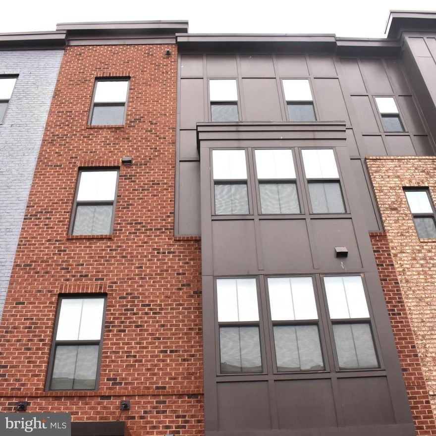 This beautifully well-kept 3-bedroom, 2.5-bath condo is located in the highly sought-after One Loudoun community. It features an upgraded gourmet kitchen with quartz countertops, a stylish backsplash, stainless steel refrigerator, and elegant pendant lighting. The spacious family room is highlighted by gleaming hardwood floors. The primary suite includes a luxurious master bath with double sinks, a standing shower, and two walk-in closets for ample storage.

The second bedroom, along with a versatile den that can easily be converted into a third bedroom, shares a full hallway bathroom. Enjoy outdoor relaxation on your private balcony. Additional features include a 1-car garage and a driveway space for a second car.

Conveniently located near major roads, shopping, dining, and entertainment, this condo offers both comfort and accessibility in a prime location. Don’t miss out on this exceptional home! 1 minute away from the One Loudoun shopping center.