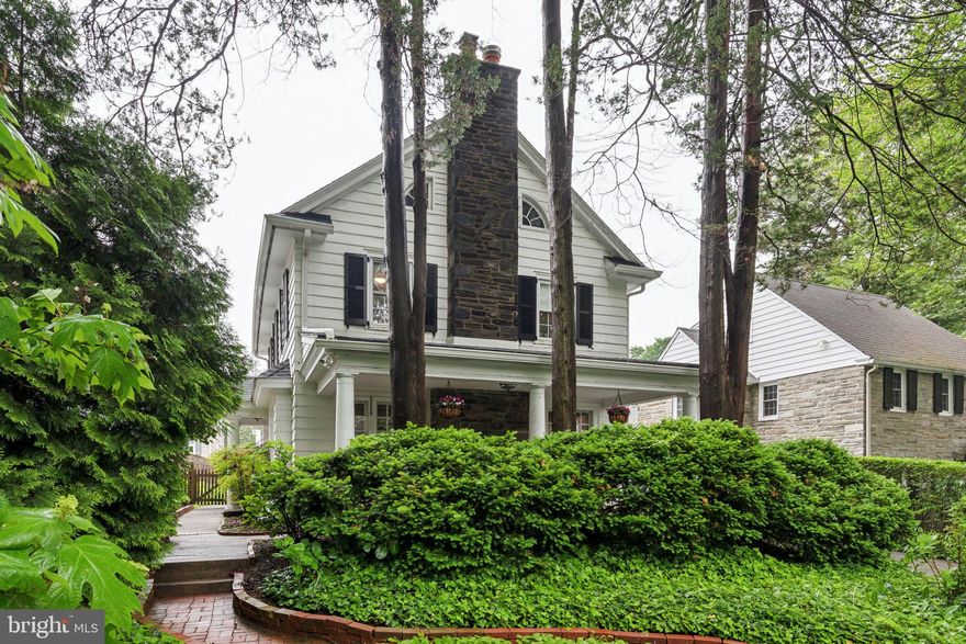 Move right into this fantastic light filled 4 Bedroom, 3 1/2 Bath Center Hall Colonial in the heart of Merion Park. The gracious Living Room has a wood burning fireplace with stone surround and slate hearth, built-ins, and French doors which lead to a covered porch; perfect for relaxing outdoors. The Dining Room is open to the updated Kitchen for today's living. A Mud Room is conveniently located off of the Kitchen. A Powder Room completes the first level. The Lower Level is finished with a Recreation Space, Laundry Room, and plenty of storage. The second floor boasts a Primary Bedroom with a walk-in closet and a renovated ensuite Bath with an oversized shower and a double sink vanity. Two nicely sized Bedrooms and a Hall Bath with a tub/shower complete this level. The third floor has a fabulous ensuite Bedroom with Bath. Hardwood floors throughout! A private driveway and a 2 car detached garage! A private fenced-in yard! All just steps to General Wayne Park and walking distance to much more!