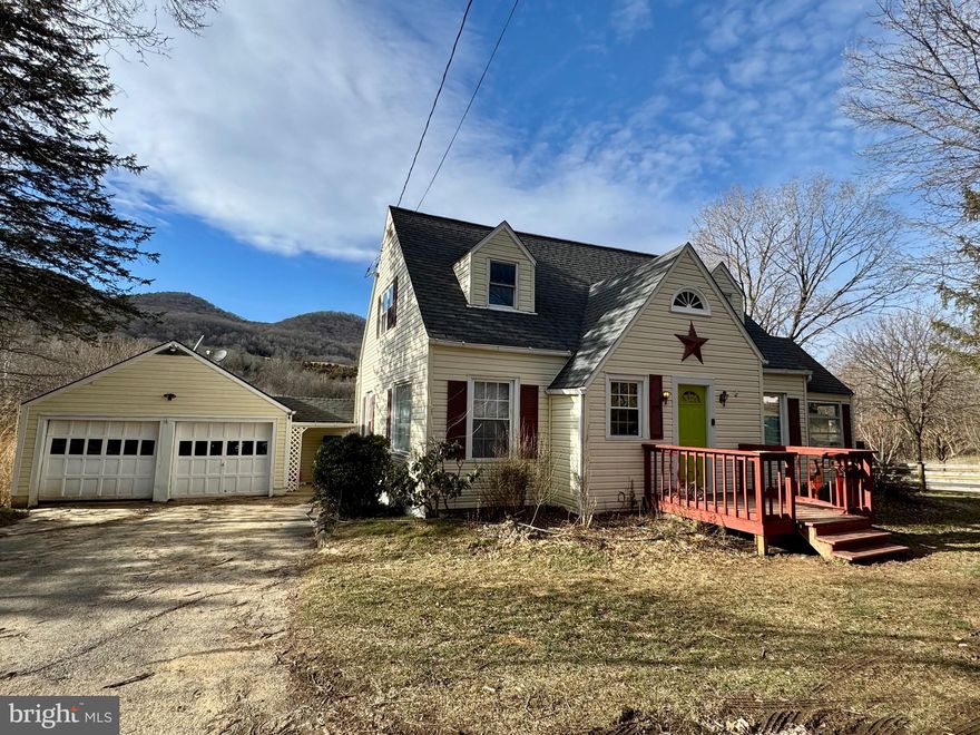 The perfect cottage feel with a pop of color! This house is a beautiful 3 bed 1.5 bath with all the natural light and all the quaint cottage feeling! Large flat yard has plenty of room for playing and entertaining. Don't miss the view from the back deck! This deck is just waiting for you and your cold drink to unwind after a long day at work or host all the family barbeques. This home has it all and located just a few minutes from town!
