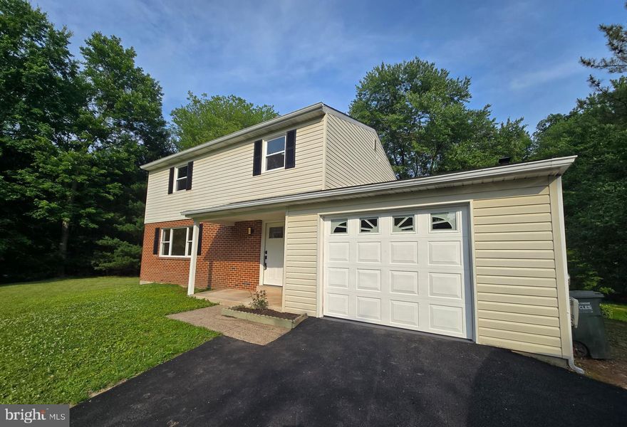Nestled on a private half-acre lot at the end of a peaceful cul-de-sac, this stunning fully remodeled and MOVE-IN ready colonial-style single home offers a rare combination of space, style, and serenity. Backing up to tranquil views, this home is truly a personal retreat in one of Southampton’s most desirable neighborhoods. The home is also located in walking distance to a well-known and popular multi-use Newtown Rail Trail in Upper Southampton Township. Step inside to find a spacious layout featuring a large living room and a formal dining room that flows seamlessly into a modern, well-appointed kitchen—complete with a beautiful island, brand new stainless steel appliances, ample cabinetry, and a dedicated breakfast area. The kitchen opens to a stunning family room with a granite-accented wood-burning fireplace perfect for cozy gatherings and access to the backyard and refinished deck through brand-new sliding doors. This 4-bedroom, 2.5-bath home includes a generous primary suite and a host of updates and amenities, including: spacious garage with inside access, nearly all new windows and doors, central air and an efficient electric heat pump, new water heater, roof, and driveway, refinished deck ideal for outdoor relaxation. Enjoy the ultimate in privacy and tranquility with peaceful backyard views, ideal for unwinding or entertaining. This home offers everything you need to live comfortably and stylishly in a prime location.