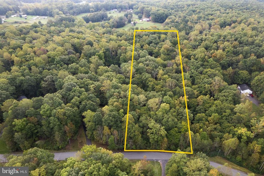Imagine building your dream home on this stunning wooded lot, nestled among beautiful mature trees. Enjoy the tranquility of nature and a small stream in the back of the property. Located off of route 17 and minutes to Route 95. , providing easy access to local amenities and attractions. This spacious lot offers plenty of privacy and room for outdoor activities, gardening, or simply enjoying the peaceful surroundings. With a conventional 4-bedroom perk already established, your dream home can be tailored to your lifestyle.
