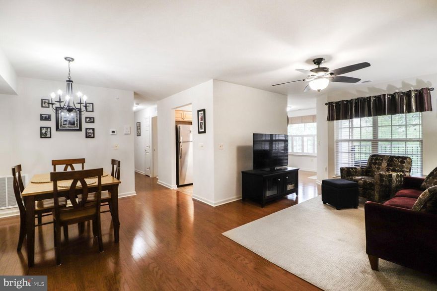 The Good Life Awaits With This Exceptional, Top Level, Wembley Square Condominium Home In Secured, Elevator Building With Great Location. Upgrades Throughout Including Flooring, Cabinetry, Appliances, Lighting Fixtures & Faucets. All Ages Are Welcome & Let Others Do The Grass & Snow! Features Auburn Oak Floors, Maple Kitchen With Granite Counters, Tile Backsplash, & Stainless Appliances, Cozy Breakfast / Sun Room, Primary Bedroom With Full Bathroom & Walk-in Closet, & Rear-facing  Private Balcony With Storage Area. Schedule Your Appointment Today For Showings That Begin April 17th!