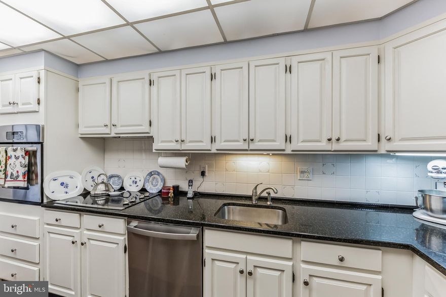 Price improvement on this beautiful condo.  Welcome to Unit #1012, a lovely and well-maintained 2-bedroom, 2-bathroom condominium that includes a separate, sizable storage closet.  Enter into the spacious living room with custom blinds and sliders that lead to a balcony with expansive views of nature and the beautiful homes beyond Yale Avenue.  Around the corner, find the dining room that flows to the cheerful and thoughtfully updated kitchen featuring tile flooring, stainless appliances, white wood cabinets, and granite counters.  Down the hall is a laundry closet with stackable washer/dryer and plenty of storage, as well as a handy linen closet.  The spacious primary bedroom has wonderful closet space and an ensuite bathroom with a shower.  A second large bedroom and hall bathroom with tub shower combination complete this unit.

Strath Haven Condominium offers 219 residential units and 19 professional offices.  The entrance features a recently updated lobby with modern decor and furnishings.  Complimentary van service offers daily shopping trips to Swarthmore, Springfield and Media.

Amenities include a large swimming pool and cabana,  hobby room,  library, and a meeting room.  The location is excellent - near Swarthmore College, the Scott Arboretum, Swarthmore town center, and the regional train station. The comprehensive monthly condo fee includes electricity, gas, water, sewer, heating, and air conditioning.  The Strath Haven condos offer a great value for this location!  Don't miss this one.