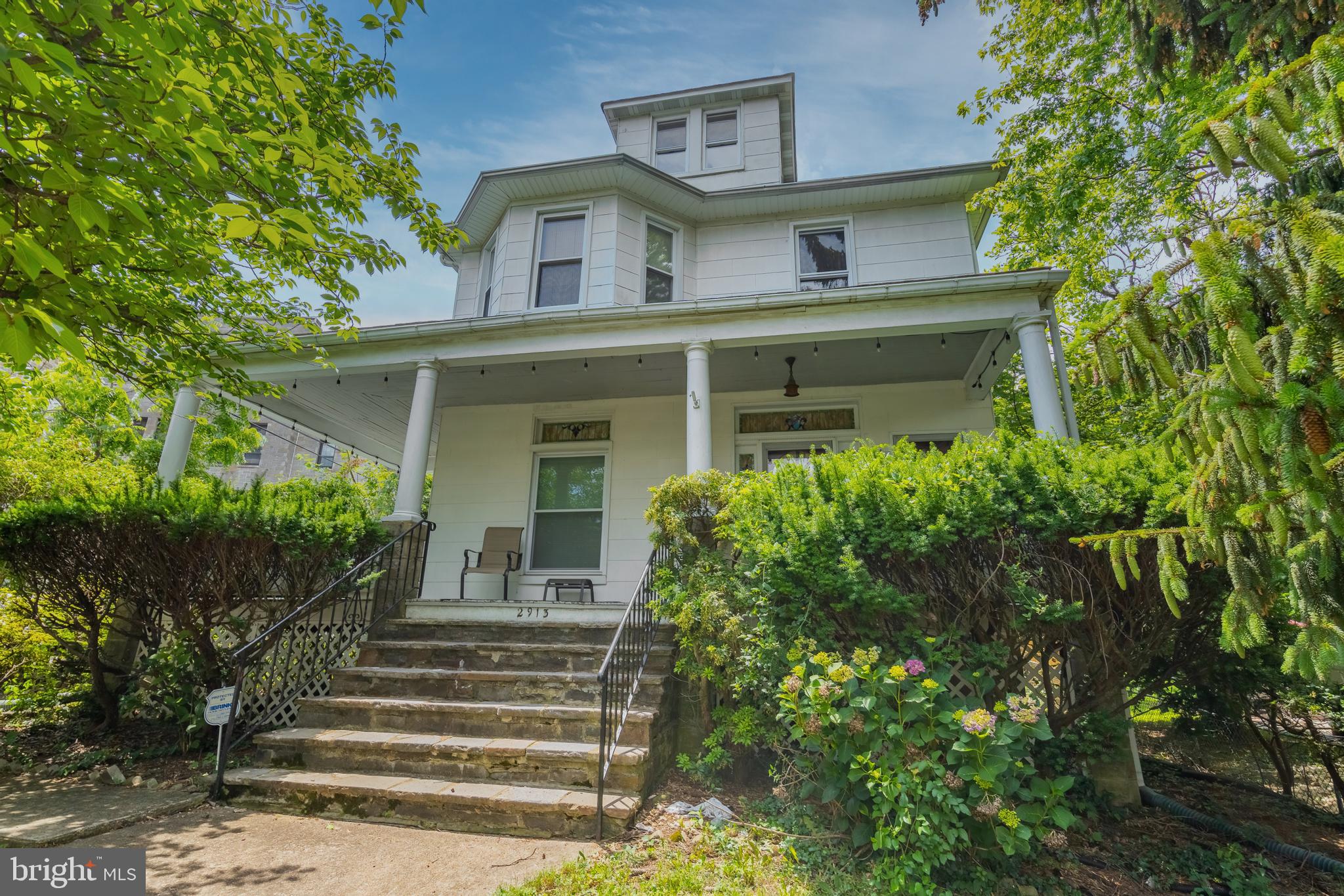 Fantastic Hamilton location! Large home with tons of original detail. Covered front porch, 9 foot ceilings, french doors, very spacious rooms, 3 finished levels in addition to basement. Original hardwood floors on main level. Great Back Yard With Patio, 900 sq ft 2+ Car Garage w/ 2nd floor storage. House is zoned as 2 units and has 2 separate Gas/Electric meters. In total, 3 heating systems; 2 zoned and 1 for whole house if you want to use it. Can remain investment opportunity as a 2 unit or covert to 1 unit and have an amazing house!