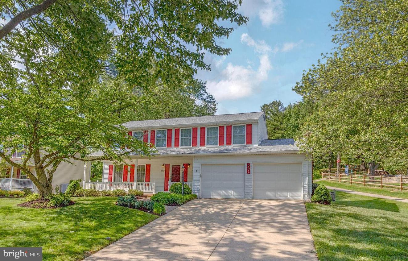 Welcome 8507 Hayshed Ln - Freshly painted and move-in ready, this 4-bedroom, 2.5-bath home offers a fantastic layout and a prime Columbia location with easy access to all major routes. The main level features a welcoming living room, formal dining room, spacious kitchen, and a cozy family room with a wood-burning fireplace—perfect for relaxing or entertaining. Upstairs, the primary suite includes a walk-in closet and private en suite bath, while three additional bedrooms share a full hall bath. The unfinished basement provides ample storage or future living space potential. Enjoy outdoor living on the large Trex deck overlooking a fully fenced yard—ideal for play, pets, or peaceful evenings at home. A wonderful opportunity in the heart of Columbia! Schedule your tour today!