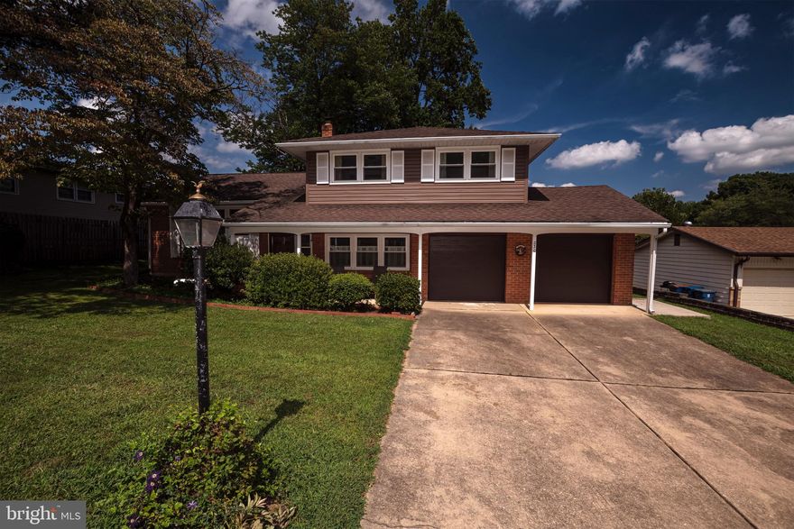 Outstanding “Holiday” Split located in sought-after Chapel Hill! This home has gorgeous curb appeal starting with the oversized 2 car garage, but not forgetting the classic brick exterior combined with the modern vinyl siding, the covered front patio, and a brand new storm door! The spacious foyer entry leads to the large living room with gleaming hardwood flooring that extends to the formal dining room and throughout the majority of the home. The kitchen has been gorgeously remodeled, boasting brand new cabinets, granite countertops, flooring & garbage disposal. Just a few steps away is a cozy family room that has access to the basement, garage, a powder room, and an office (that was originally the fourth bedroom, and could possibly be used as a 5th bedroom). Now, this isn’t your average “Holiday” Split. Off of the family room, there is also a main level primary bedroom addition! It boasts a vaulted ceiling with recessed lighting, its own heat and air conditioning, access to the backyard, a walk-in closet, and a massive primary bathroom with a beautifully tiled shower and another closet that is hooked up for main level laundry (the washer and dryer are located in the original basement location)! The third level features another full bathroom and 3 more generously sized bedrooms. Additional features include vinyl windows and gas heat and central air (the bedroom addition is on its own heat pump). This home is located just minutes from Main Street Newark, the University of Delaware, Pike Creek, the Newark Reservoir, the Pennsylvania state line, a vast selection of restaurants and shopping, and major routes making your commute an absolute breeze! Having been lovingly maintained for over 50 years, this is a wonderful place to call home!