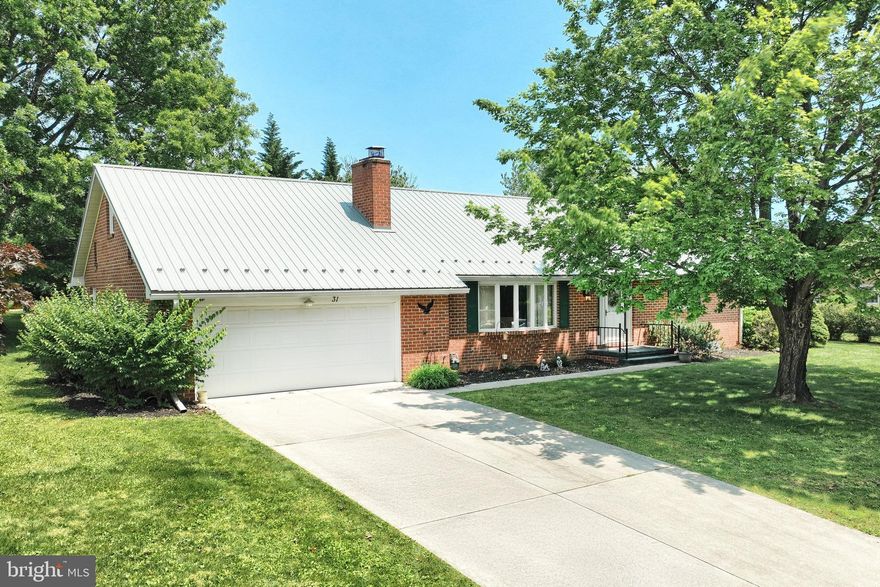 Lovely 4 Bedroom Cape Cod located on a quiet street in Upper Adams School District.  
Home features a large living room with brick fireplace, cozy dining room, and great eat in kitchen with appliances and lots of cabinetry.  First floor offer 2 bedrooms, full bath with walk in shower, and stackable laundry hook up.  2nd floor has 2 bedrooms with  full bath and a  large attic space or bonus room.  
Home offers a full unfinished basement, laundry hook ups, 2 car garage, and  newly renovated sun room with patio doors leading  you a wonderful back yard.   This is a quality brick home within walking distance to the library, grocery store, and schools, and just minutes to route 15 and historic Downtown Gettysburg.    Very nice!