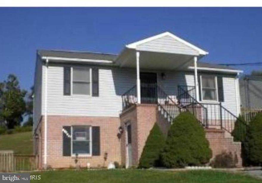 Available now! 1-bedroom, 1-bathroom apartment, built in 1993, offers a cozy retreat in a convenient setting. It features essential appliances including a refrigerator, electric oven/range, and washer/dryer for your convenience. Enjoy the comfort of carpet and vinyl flooring throughout, creating a warm atmosphere to call home. Located just off I-81 and close to the MD line. The unit includes two driveway parking spaces, ensuring easy access. Available for lease starting now, with flexible terms ranging from 12 to 36 months, this apartment is perfect for those seeking a comfortable living space. The lower unit is available with a tenant in the upper unit. Your rent includes, garbage, lawn care, water and septic. You only have your electric and cable to pay. Great savings on utilities makes this an affordable option. Washer and dryer included to use (as-is). Pets are case by case.