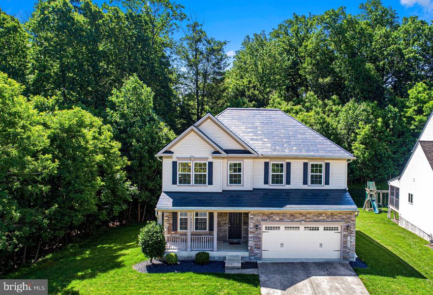 WELL MAINTAINED  5 BEDROOM/3.5 BATH STONE & SIDING COLONIAL IN BLAKE'S LEGACY. THIS MODERN OPEN LIVING FLOOR PLAN OFFERS A SOPHISICATED NEUTRAL COLOR PALETTE, 9 FT CEILINGS,  8FT MAIN LEVEL INTERIOR DOORS, AND RICHLY COLORED HARDWOOD FLOORING THROUGHOUT THE MAIN & UPPER LEVELS. THE STYLIZED GOURMET KITCHEN IS EQUIPPED WITH 42" CABINETRY, GRANITE COUNTERTOPS, GENEROUS ISLAND W/SEATING, GE CAFE STAINLESS APPLIANCES, 6 BURNER GAS RANGE, AND WALK-IN PANTRY. DINING ROOM IS LIGHT FILLED SURROUNDED WITH WINDOWS AND A CATHEDRAL CEILING. FAMILY ROOM IS OPEN TO THE KITCHEN WITH THE AMBIANCE OF A GAS FIREPLACE & CLASSIC WOOD MANTLE. UPPER LEVEL LOFT IS PERFECT FOR A GAME/PLAY ROOM,  OR JUST A HANG OUT SPOT. PRIMARY BEDROOM HAS A TRAY CEILING W/CROWN MOLDING, WALK-IN CLOSET, AND EN SUITE  W/DUAL VANITY WITH GRANITE COUNTERTOP, SOAKING TUB, SEPARATE SHOWER, AND WATER CLOSET. FINISHED LOWEL LEVEL HAS A RECREATION ROOM, TRUE 5TH BEDROOM W/EGRESS WINDOW & WALK-IN CLOSET, FULL BATH, WALK-UP TO REAR YARD, AND 2  STORAGE ROOMS. COMPOSITE DECK HAS STAIRS OVERLOOKING A PATIO AND YARD BACKING TO TREES. PRIVATE AND PEACEFUL SETTING. CONVENIENTLY LOCATED TO SCHOOLS, DOWNTOWN BEL AIR, APG, SHOPS, AND RESTAURANTS. TESLA SOLAR POWERED ROOF IS OWNED AND IS PAIRED WITH THE TESLA POWERWALL WHICH IS A COMPACT HOME BATTERY PROVIDING 24/7 ENERGY DAY OR NIGHT EVEN DURING AN OUTAGE. THE TESLA EV CAR CHARGER HAS WIFI CONNECTIVITY FOR ACCESSING THE LATEST CHARGING FEATURES AND OVER-THE-AIR UPDATES. THE GEOTHERMAL HEATING AND AIR CONDITIONING SYSTEM CAN PROVIDE LONG TERM SAVINGS ON ENERGY BILLS.