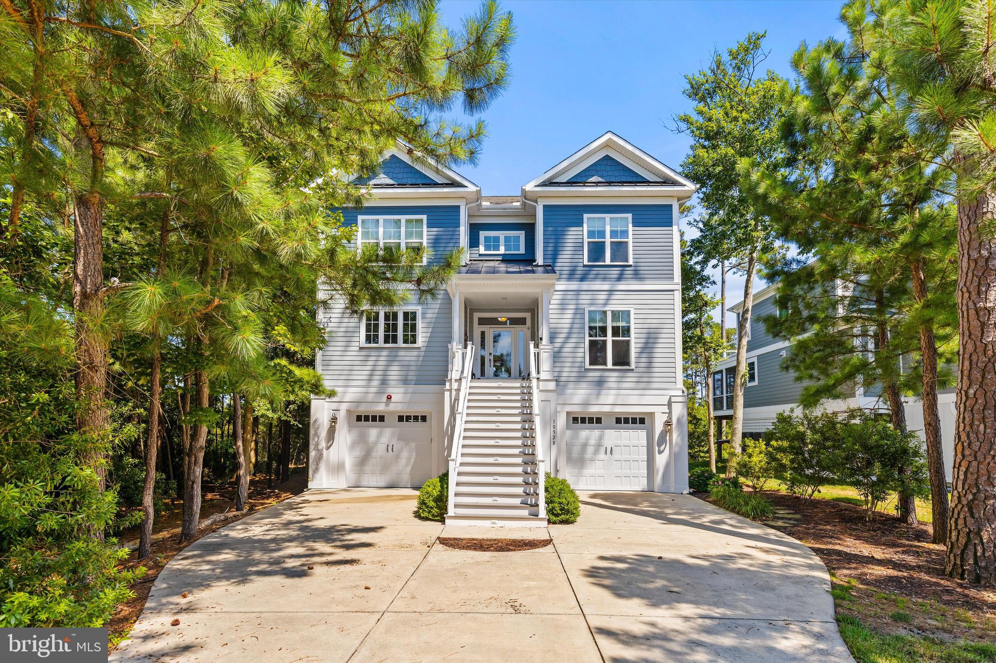 This beautiful waterfront home was built for "Good Times". With 6 bedrooms and 5 full baths, there is plenty of room to bring the whole crew - family, friends and whoever is lucky enough to get the invite. An open design keeps everyone connected and in view, whether you're cooking up a large breakfast, playing cards or relaxing after a day on the water.
The two large decks offer spectacular views of water and wildlife to include blue heron, osprey, squirrels, bunnies, deer and more. This extended living and entertainment space also creates the perfect location to enjoy an early morning coffee and sunrise or winding down with a moonlit night cap and your favorite music. Early tranquil or late night laughs, this is where the memories happen.
The garage level offers ample space for all your toys and storage needs as well as an oudoor shower.
Located in a culdesac where traffic is at a minimum, you are still just a few steps away from the marina, boat rides, kayaking, paddleboating and dockside strolls.
Did we mention 2 award winning golf courses and Ruth's Chris are also within the community.
Whether you are looking for a fulltime residence or a second home, 10528 War Dancer Ln just feels easy, welcoming, light filled, laid back and ready for whatever you want to do with your day.
It's the house you'll Love to call Home.
