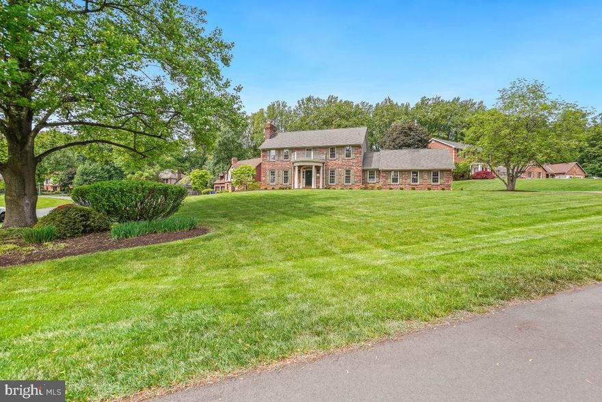 One of Stonegate's prettiest homes on a spectacular lot - immense presence - on a gentle hill with lovely views in every direction. Wonderfully renovated home - choices curated with good taste and fresh, modern finish. Enter a two story foyer with graceful stairway. Spacious living room with brick fireplace, wood trim, French doors looking out onto lush leafy views. Fabulous sunny kitchen with stone countertop and custom backsplash, abundant custom cabinetry, high end stainless appliances including Sub-Zero fridge and a delightful table space overlooking deep backyard.  Inviting family room off the kitchen - peaceful - just a great place to be. Oversized side loading two car garage. Stunning, extra large owner's suite that you will never want to leave featuring a sitting area with fireplace - French doors to balcony - large walk in closet and newly renovated full bath with white quartz and white subway tile! All bedrooms are good sized. Wonderful lower level with outside entrance! Large rec room with bar, den/study and full bath! Such a beautiful home sweet home sited on cul de sac - lovely in every way. Open Saturday 1-3 and Sunday 2-4.