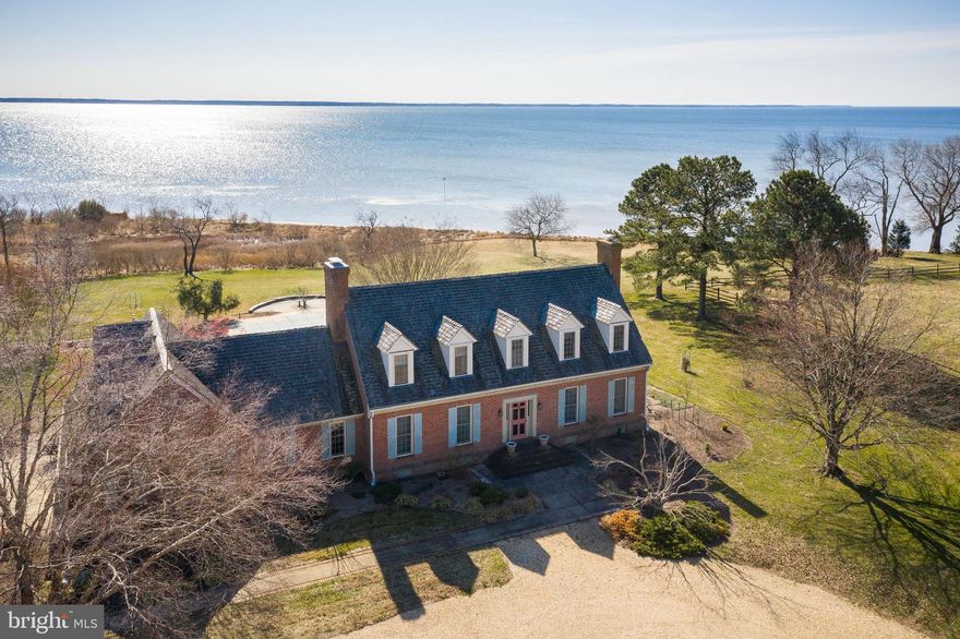 Your own private oasis! Stunning waterfront home located on 15 acres on Eastern Bay on Kent Island. Fenced pastures, barn, run-in shed are perfect for horses. The brick home features 4 bedrooms and 4 baths; the first floor bedroom is currently being used as an office. Gorgeous wide heart pine floors throughout. The glass enclosed sunroom is perfect to relax and enjoy the wide Bay waterviews. In addition there is a large 1st floor family room, formal living room, formal dining room and large eat-in kitchen.  In the summer you will enjoy the inground pool on the spacious grounds.  Sprinkler system and cedar shake shingles complete the picture. A must-see home; you won't want to leave!