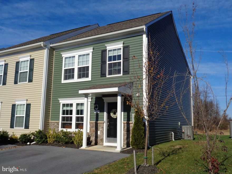 Sought after almost new END UNIT TOWNHOME with all the upgrades and the hard to find two-story bump out providing you with the optional sunroom and the optional larger MBR. This pristine home FEATURES THREE BEDROOMS, TWO AND HALF BATHS; and an upgraded REAR STAMPED PATIO for BBQ, entertaining and enjoying the expansive peaceful views out the back. This beautiful home HAS Luxury VINYL PLANK FLOORING through the entire main level, and brand new carpeting throughout the upper level. Kitchen boasts gleaming STAINLESS STEEL APPLIANCES, GENEROUSly sized QUARTZ COUNTER TOPS and a large center ISLAND with stylish pendant lights.
BEDROOM LEVEL LAUNDRY FOR ADDED CONVENIENCE. ONE OF JEFFERSON COUNTY'S MOST CONVENIENT LOCATIONS TO SHOPPING, DINING, COMMUTER ROUTES, as well as outdoor activities along the Shenandoah River and Blue Ridge Mountains.