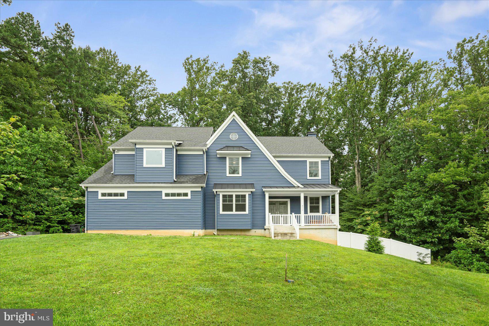 GORGEOUS 4 Bedroom 4 FULL and 1 HALF Bath Colonial in Kingsville * This STUNNING home was built in 2023 and has over 4700 square feet of living space and is on 1.5 acres full of PRIVACY * Features Include: SPACIOUS kitchen with top of the line GRANITE countertops, stainless steel appliances, breakfast bar and a SUN filled window seat overlooking the inground CUSTOM BUILT pool built by Woodfield Pools (heated SALTWATER pool with lights) * LARGE living room with a WOOD burning fireplace, a bedroom, half bath and PET shower completes the MAIN level * LUXURY vinyl plank flooring throughout the house * The UPPER level offers a HUGE primary suite with sitting room and FULL bath, two additional bedrooms and TWO full baths * On the LOWER level you will find an expansive family room with sliders to the FENCED yard as well as a bar area with refrigerator, FULL bath and PLENTY of storage * There is a sprinkler system throughout & THREE car garage with a MULTI car driveway * A MUST SEE!!