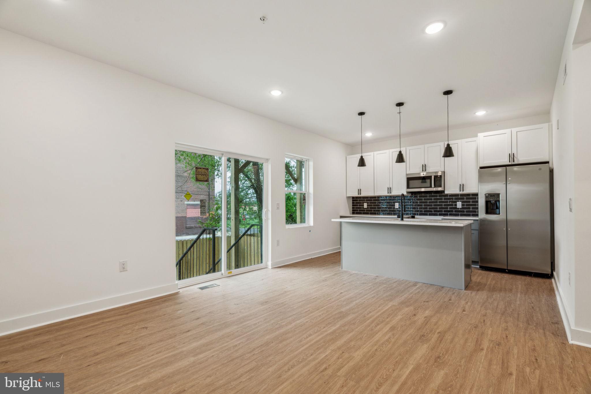 Be the first to live in this beautiful new construction home on a double wide lot. Upon entering the spacious unit with 10 foot ceilings, you will notice the open living area with an abundance of natural sunlight from the oversized original windows. You will be greeted by the state-of-the-art kitchen complete with brand new stainless steel appliances, flawless quartz countertops and ample cabinetry. Continue into the unit, you will find 2 bedrooms and custom full baths. This unit is also complete with your own in-unit laundry, private outdoor space and a shared roof deck! Don't wait - Schedule your showing today!
Tenants are responsible for the following utilities:
Water $50/mo flat fee (up to 2 people)
All Electric building (based on usage)
No gas bill
Internet
Text the listing agent for a video tour!