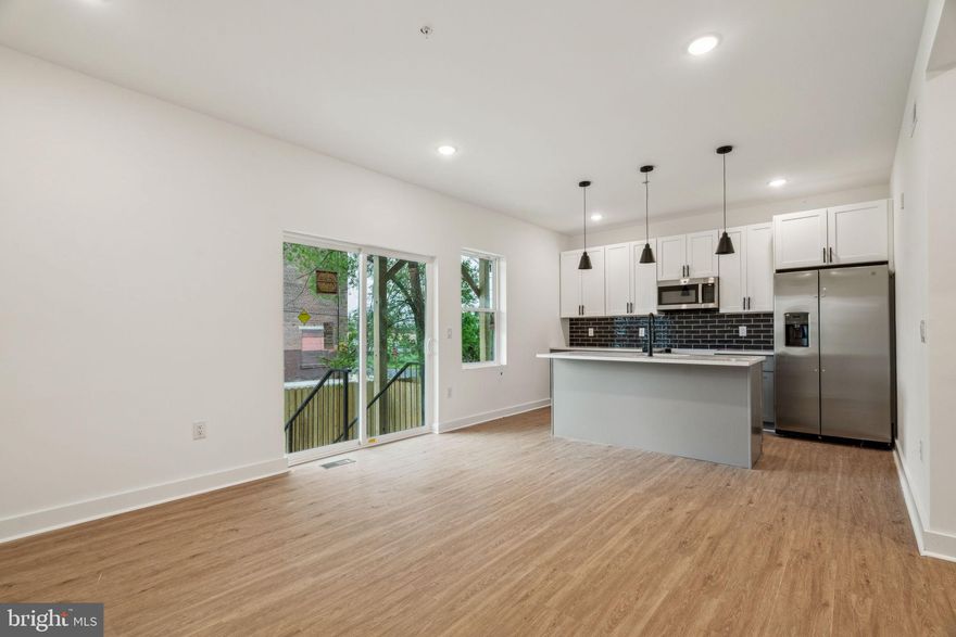 Be the first to live in this beautiful new construction home on a double wide lot. Upon entering the spacious unit with 10 foot ceilings, you will notice the open living area with an abundance of natural sunlight from the oversized original windows. You will be greeted by the state-of-the-art kitchen complete with brand new stainless steel appliances, flawless quartz countertops and ample cabinetry. Continue into the unit, you will find 2 bedrooms and custom full baths. This unit is also complete with your own in-unit laundry, private outdoor space and a shared roof deck! Don't wait - Schedule your showing today!

Tenants are responsible for the following utilities: 
Water $50/mo flat fee (up to 2 people)
All Electric building (based on usage) 
No gas bill
Internet 

Text the listing agent for a video tour!