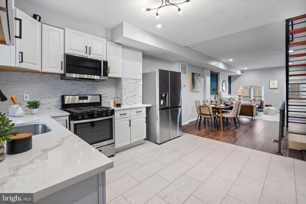 Photo of 605 N Belnord Avenue, BALTIMORE, MD 21205 (MLS # MDBA2194652)