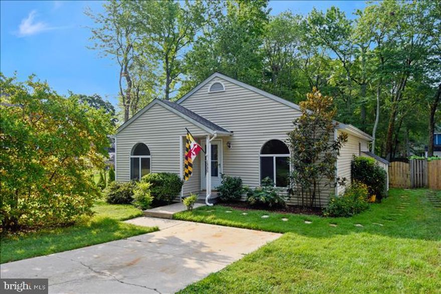 Simply a lovely, peaceful cottage - style home to call you own. Move in ready. Situated on a quiet street, a nicely landscaped yard welcomes you to this  home that has three bedrooms and 2 FULL baths. Hardwood floors . Eat in kitchen is light-filled filled and has granite counters,oak cabinets, and stainless appliances.   A magnificent full bath in second bedroom  with 2 shower heads and stunning tile work with a rolling shower door!!! Back deck is very welcoming  for entertaining. And there is a good sized fenced yard. Patio us waiting for your Fire Pit. Custom shed built in 2017 New roof in 2018.  This neighborhood has playgrounds,water access, a community beach, and is simply a great place to walk or jog. Starbucks close by as well as many ,many local eateries , athletic clubs and yoga studios. Farmers markets also. Close to all major routes.