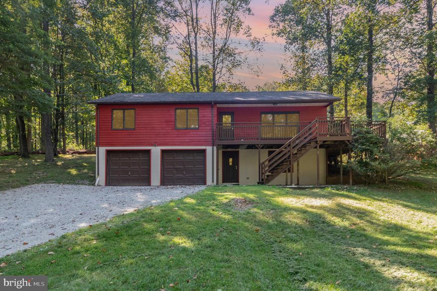 Welcome to 31 Eagles Trail in Fairfield, a peaceful retreat minutes from the slopes. 

Tucked away on a quiet hillside in the heart of Carroll Valley, this charming raised ranch offers a perfect blend of privacy, space, and location. Just minutes from Liberty Mountain Resort, it’s a rare opportunity to own a versatile home surrounded by nature—with room to relax, gather, and explore.

Inside, you’ll find three comfortable bedrooms, two full baths, and an inviting layout designed for everyday living. The main level features a light-filled living space and a beautifully updated kitchen, complete with sleek granite countertops and stainless steel appliances. The primary suite includes a private full bath, while two additional bedrooms offer flexibility for guests, home office space, or family living. New LVP flooring, plush carpet, and custom built-in shelving add both style and function.

Step outside to the expansive wrap-around deck, where wooded views and fresh mountain air create the perfect backdrop for morning coffee or evening sunsets.

Downstairs, a  finished lower level includes a large recreation room and a bonus room that’s perfect as a guest space, office, or fourth bedroom. A two-car garage and storage area provide plenty of space for outdoor gear, tools, and more.

Located just 3 miles from the Maryland line and a short drive to Gettysburg, this home offers easy access to year-round activities—from skiing and golfing to hiking and historic sightseeing. Schedule your showing today!